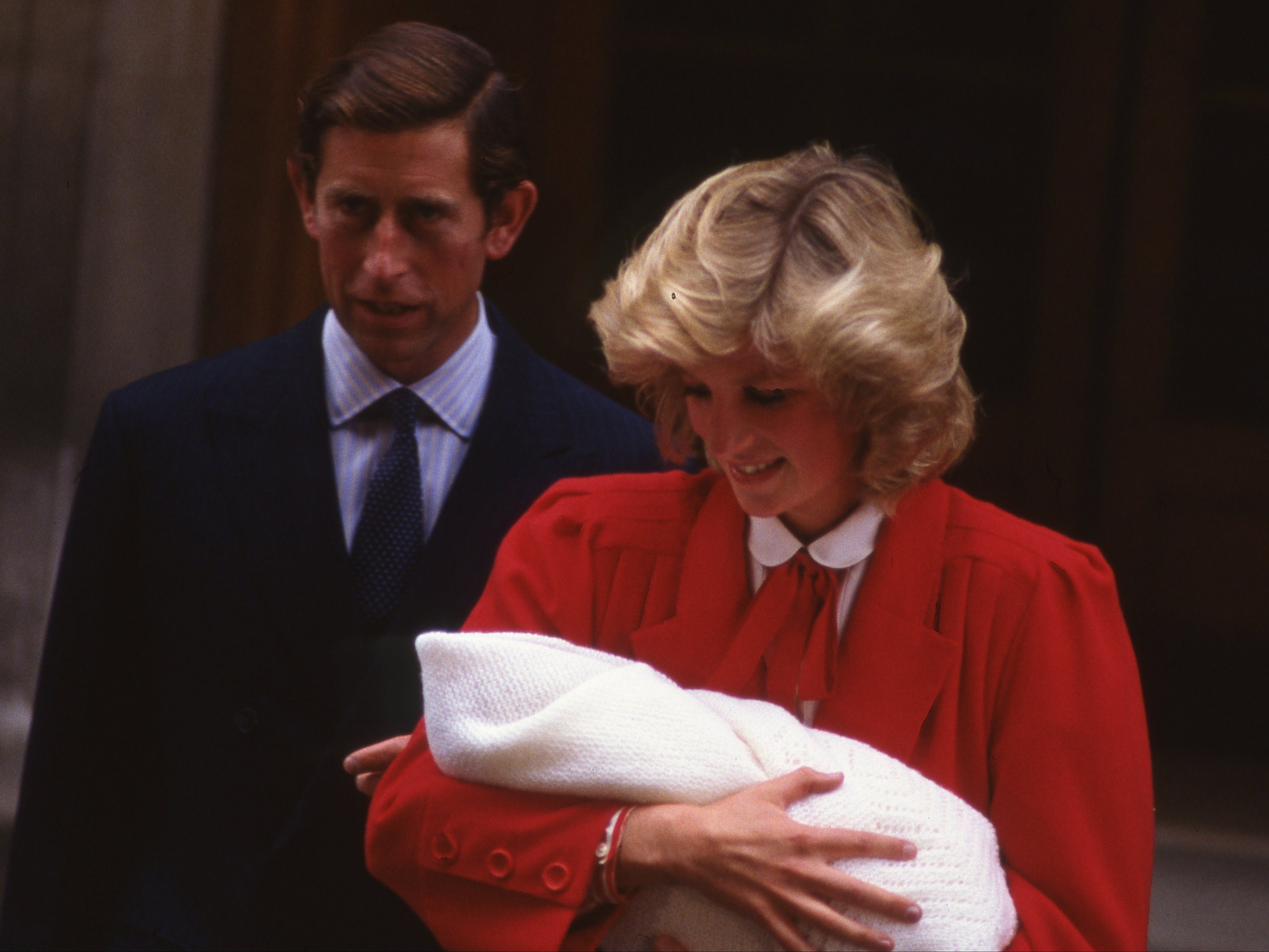 Prince Charles and Princess Diana with newly born Prince Harry