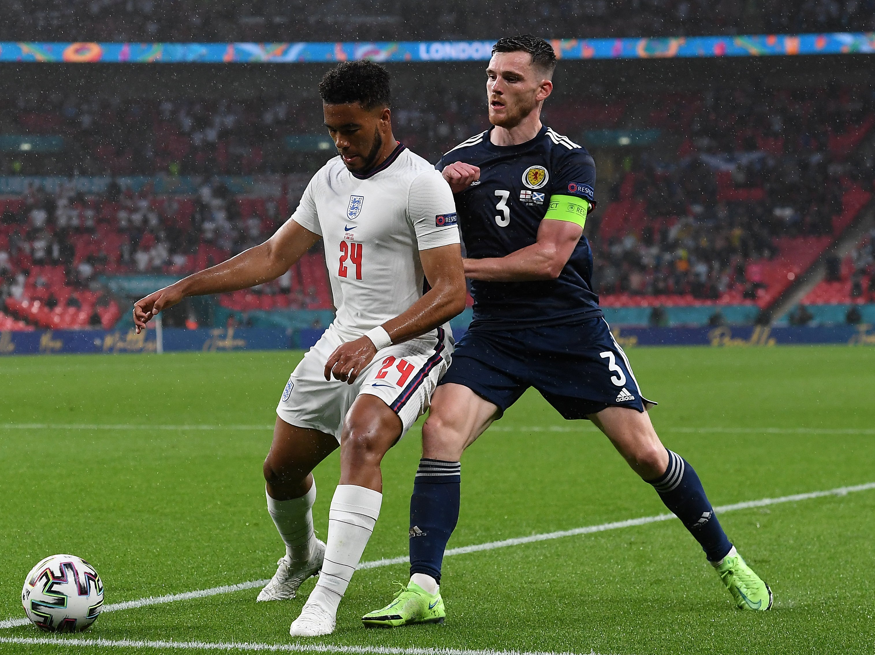 Right back at you: Reece James battles with Andy Robertson in the mealy fixture between England and Scotland