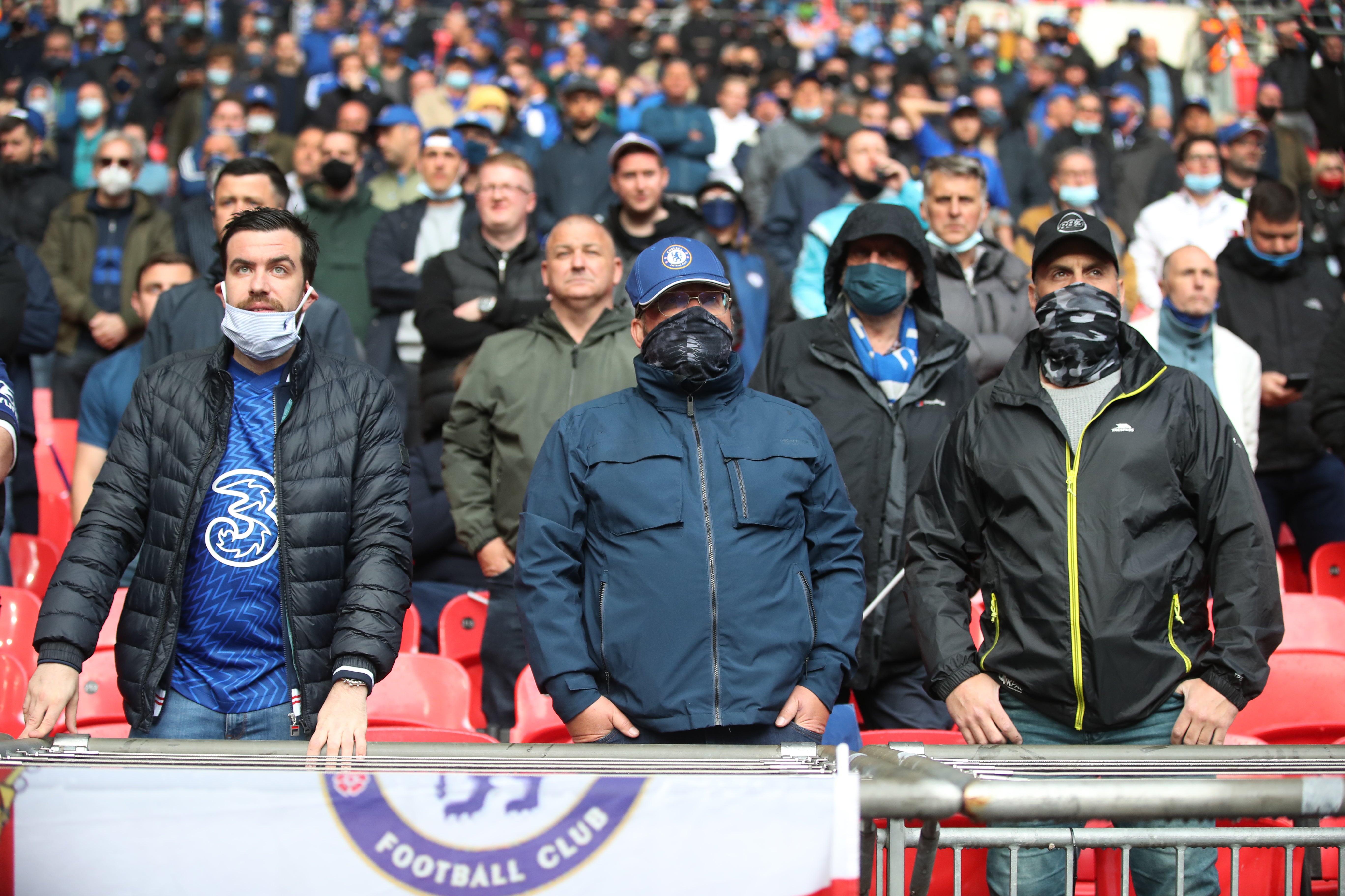 Chelsea fans appear dejected after their team's defeat by Leicester in the FA Cup final