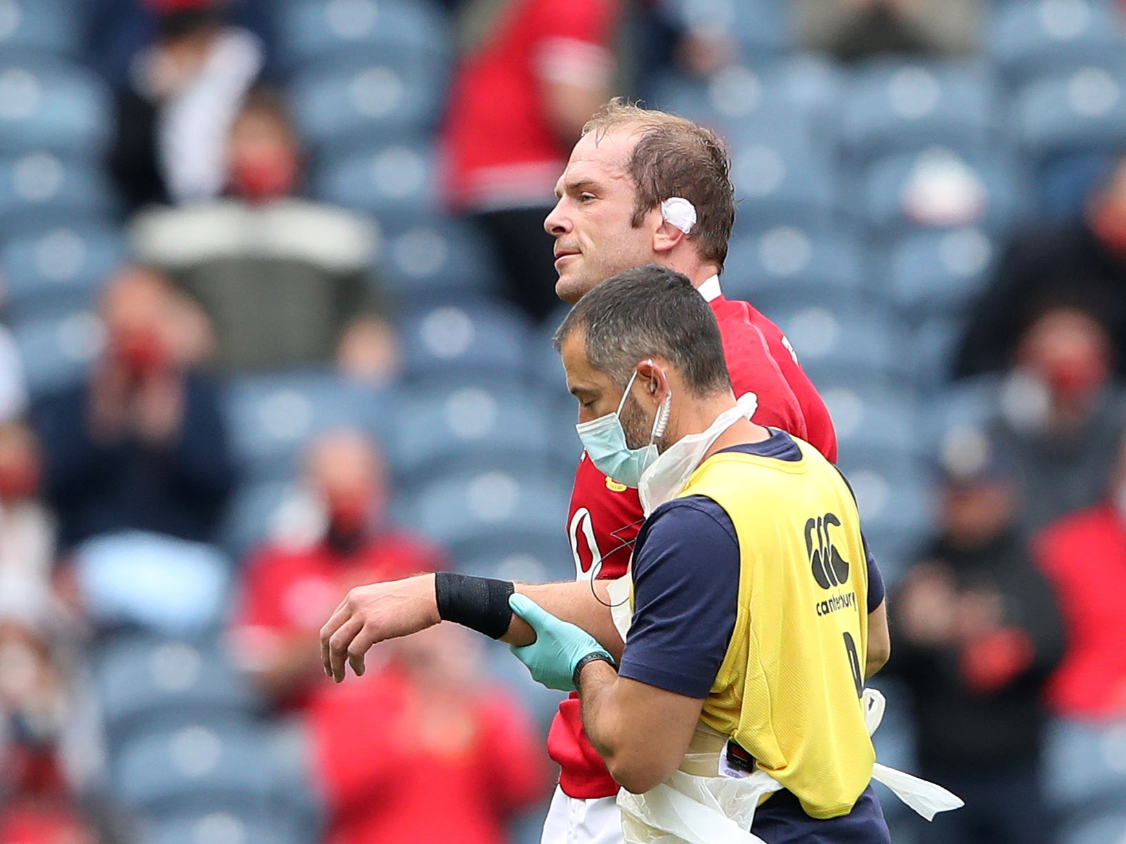 Lions captain Alun Wyn Jones leaves the field with an arm injury