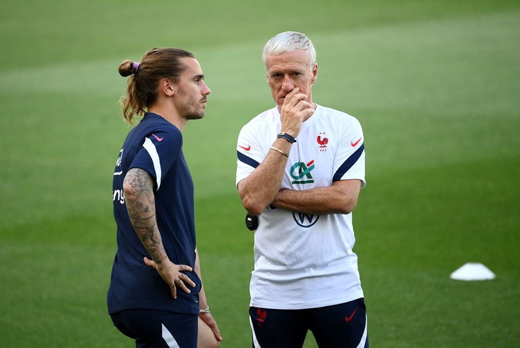 Antoine Griezmann with France manager Didier Deschamps