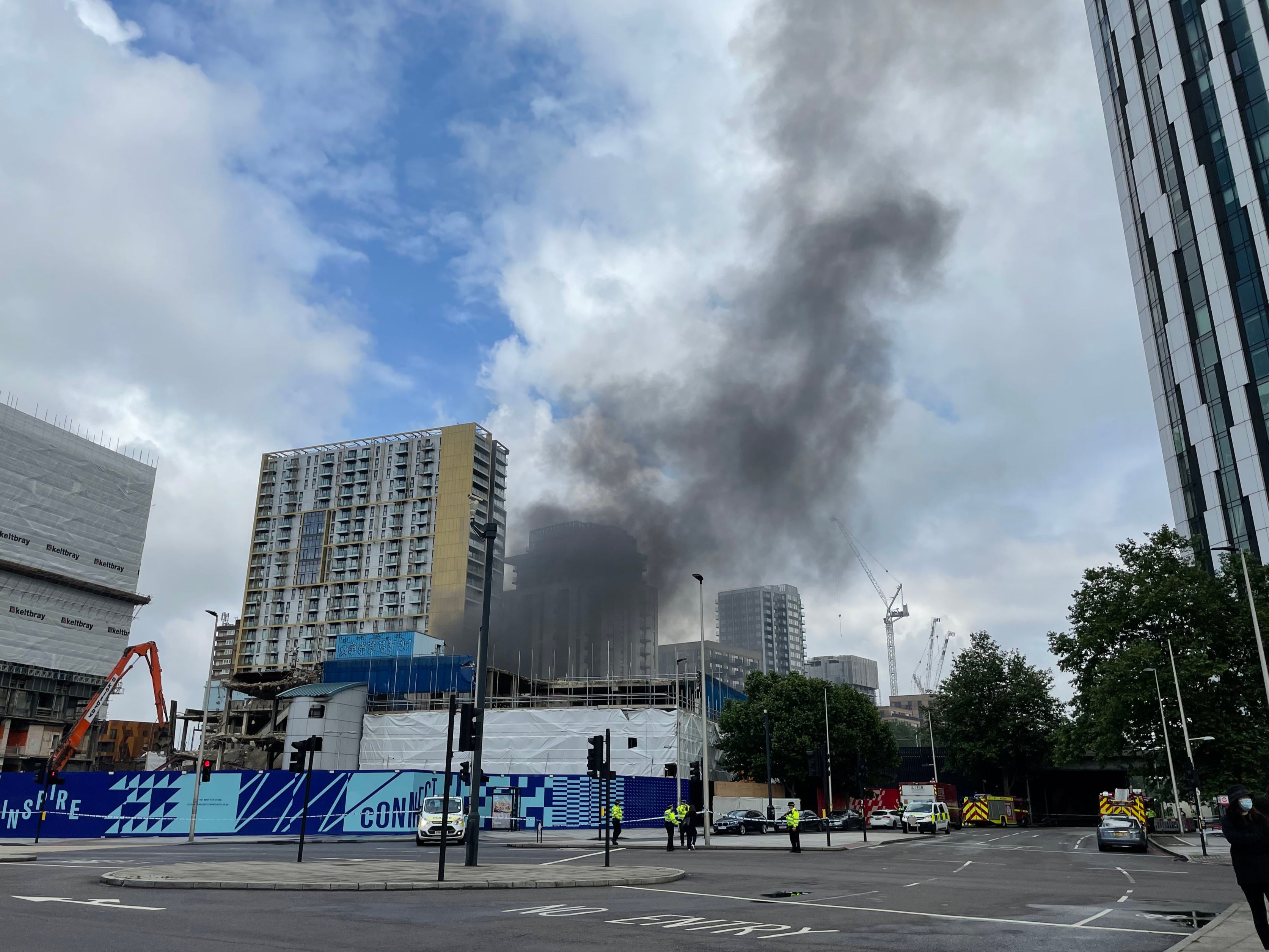 Emergency services at the scene of a fire that has broken out at garages close to Elephant and Castle railway station