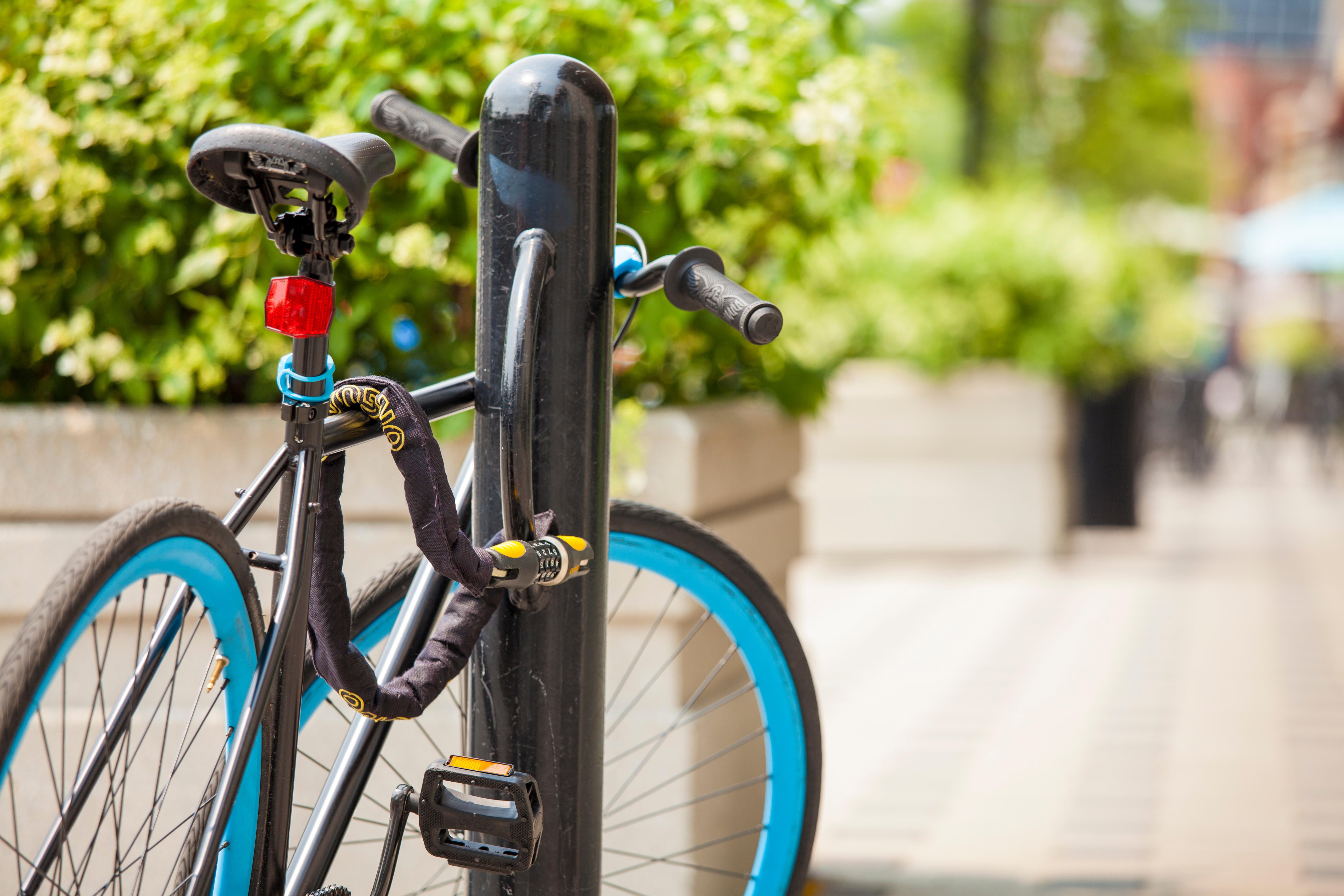 bike locked on the sidewalk