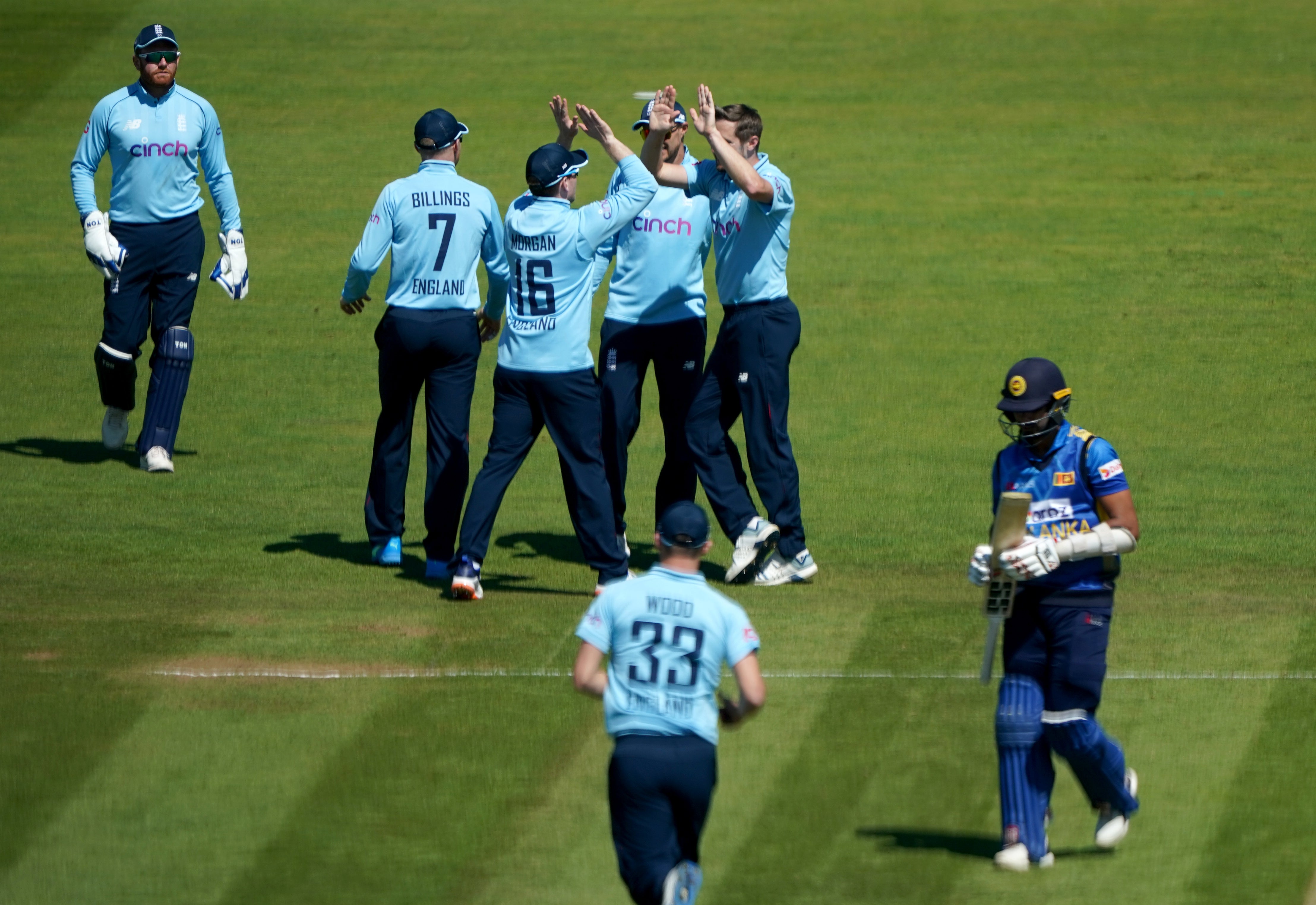 Chris Woakes celebrates the dismissal of Dasun Shanaka