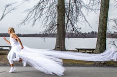 Woman runs almost 300 miles in wedding dress to raise money for domestic abuse victims