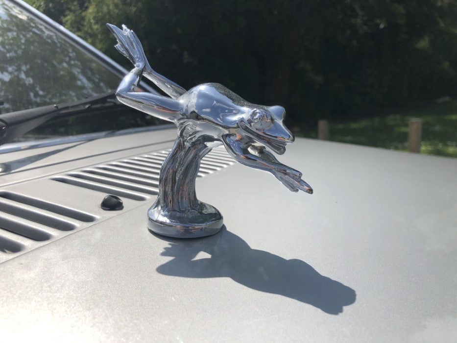 A silver frog mascot sits on the bonnet of the Ford Escort that formerly belonged to Princess Diana