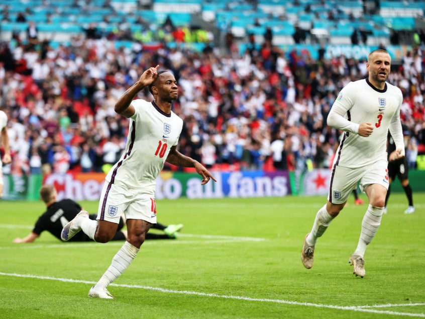 Raheem Sterling celebrates breaking the deadlock