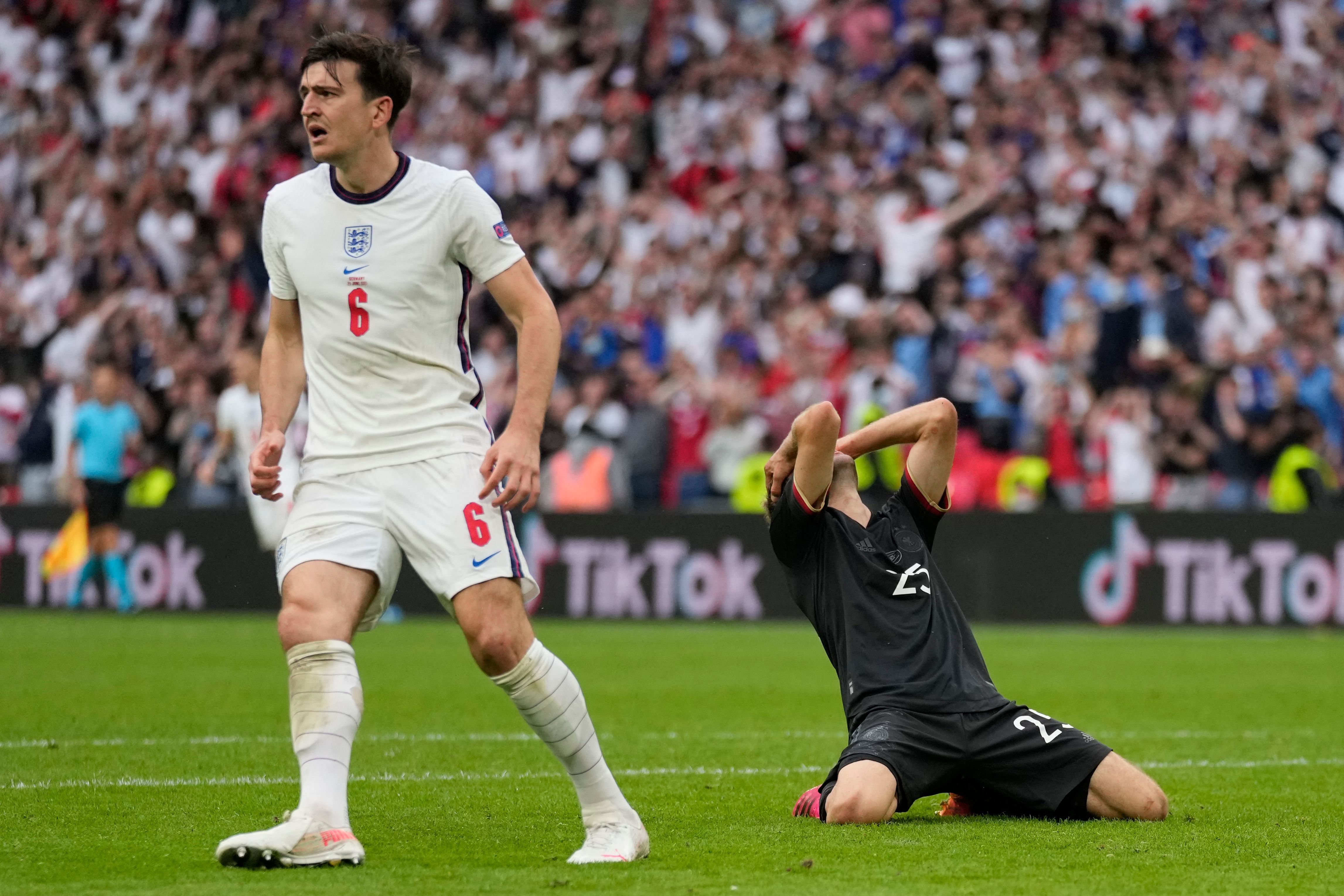 Thomas Muller reacts after his miss against England