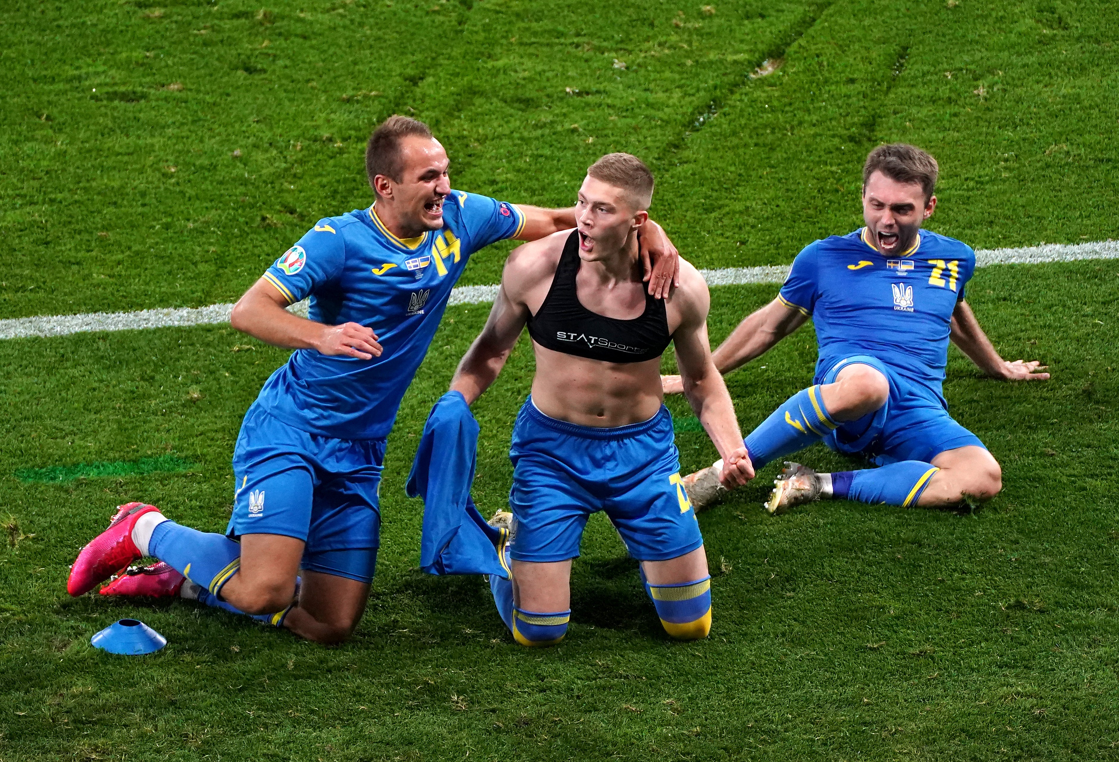 Artem Dovbyk, centre, scored a stoppage-time winner in extra-time to set up the quarter-final with England