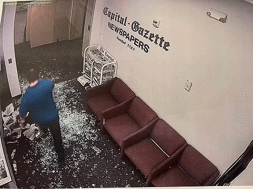 An employee at the Capital Gazette newspaper is seen during the 2018 shooting that killed five people.