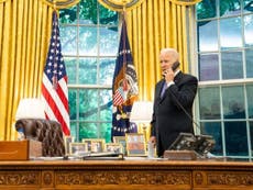 QAnon spreads Biden photo online claiming it shows Trump is secretly in the White House