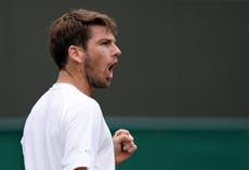 Cameron Norrie hits back to beat Lucas Pouille and reach Wimbledon second round