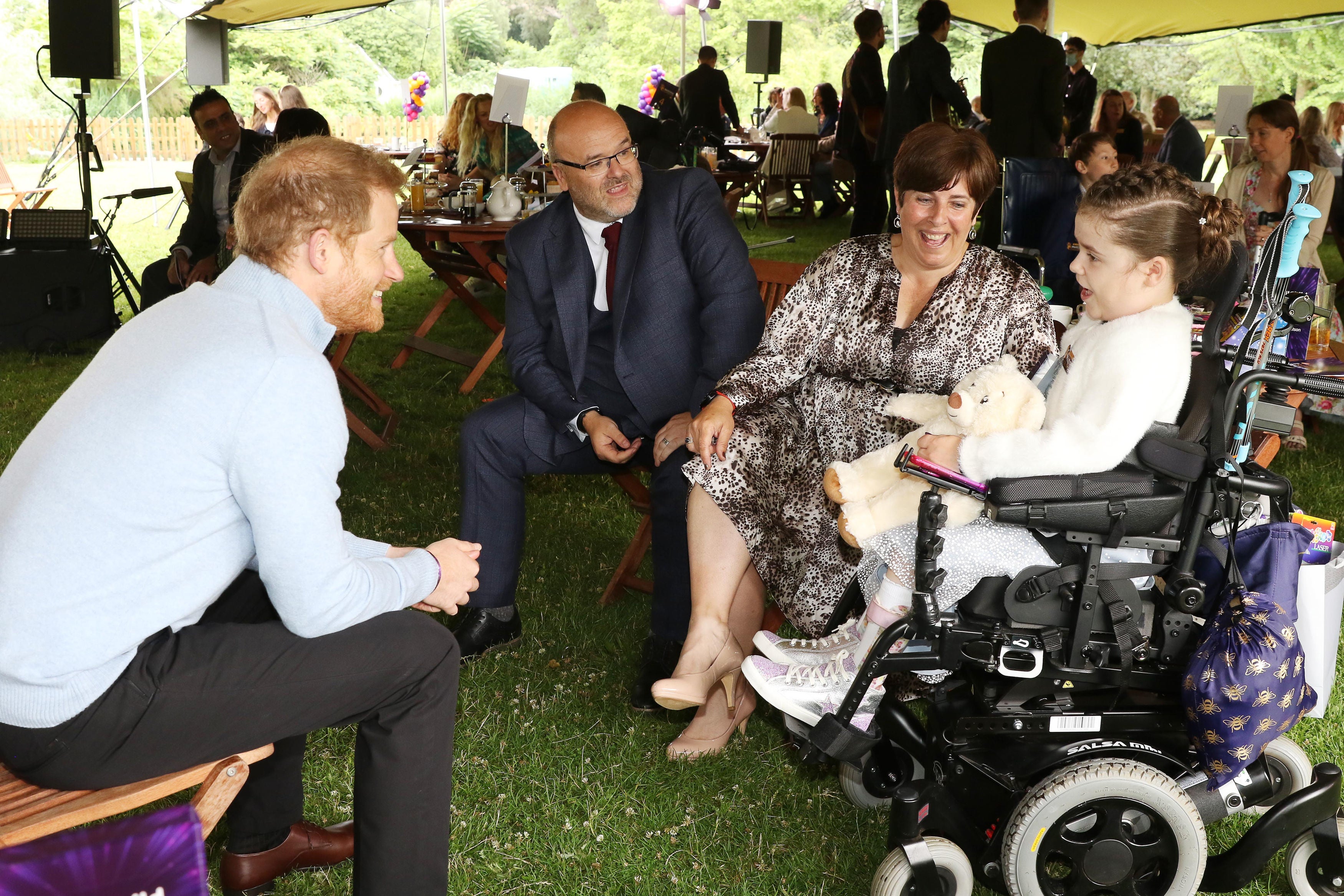 The Duke of Sussex speaking to Inspirational Child award winner Carmela Chilery-Watson during the WellChild Awards 2021 at Kew Gardens, London