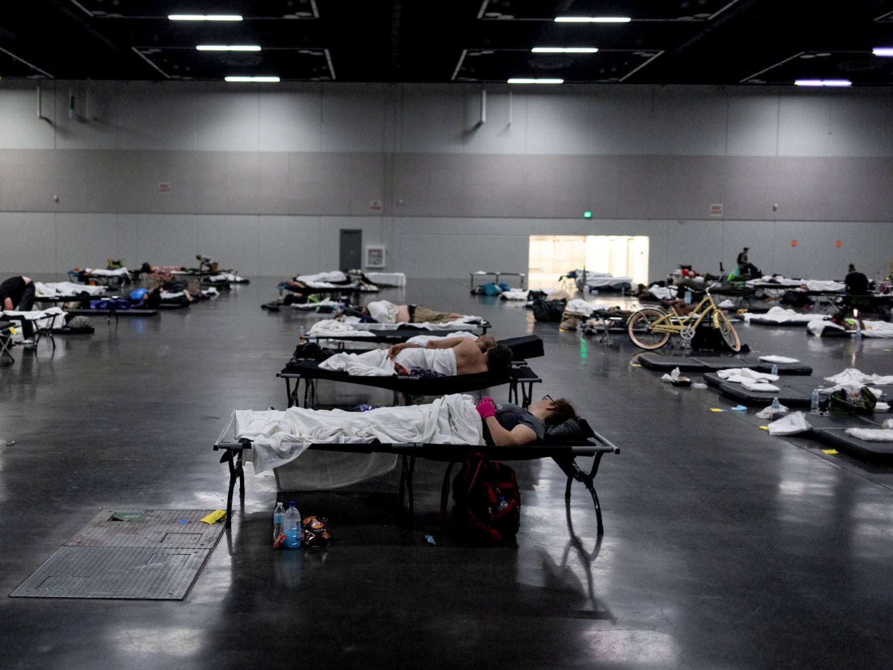 People gather in a ‘cooling centre’ during Portland’s record heatwave