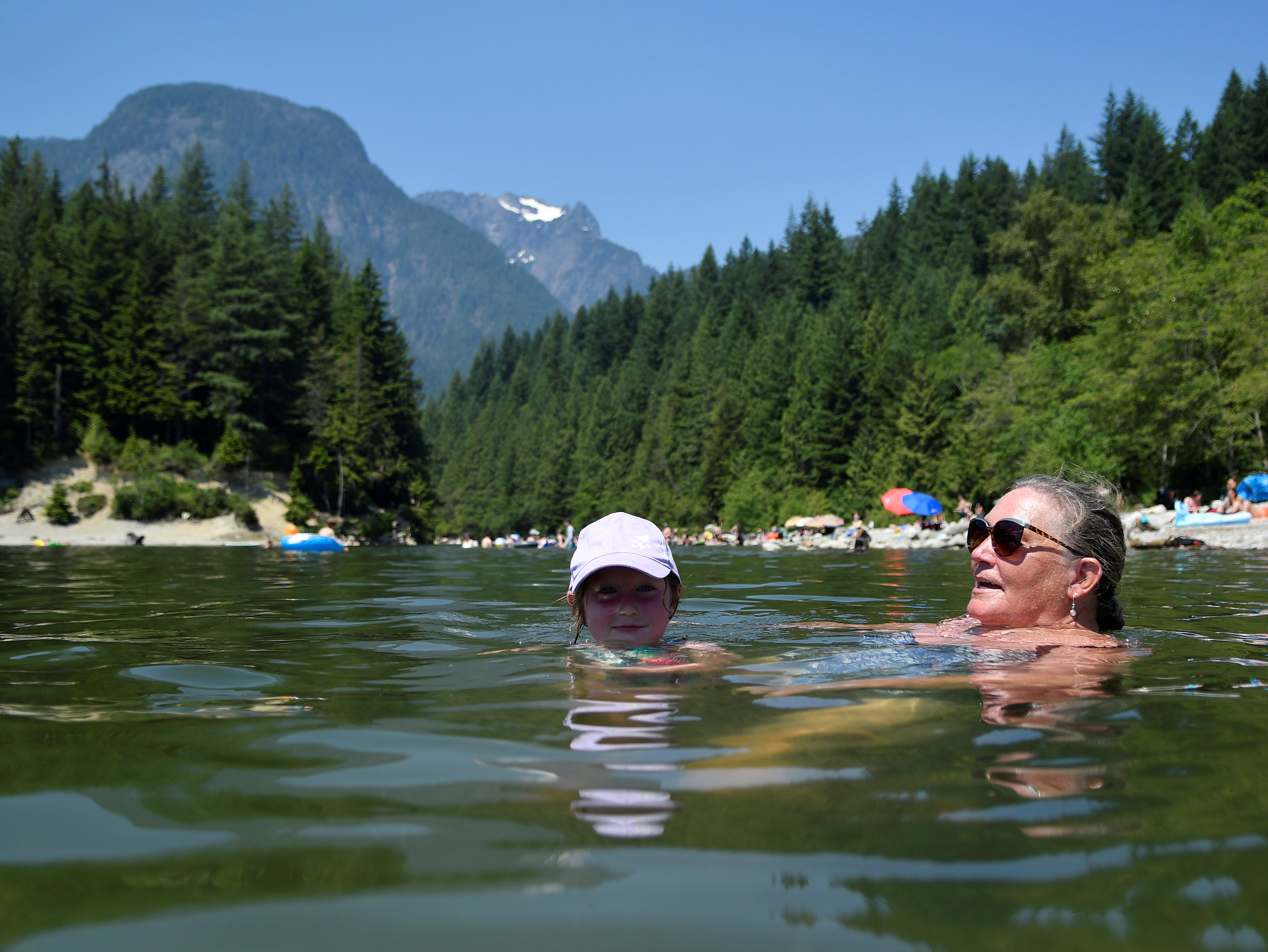 Kim Cullen and her granddaughter in a lake in British Columbia