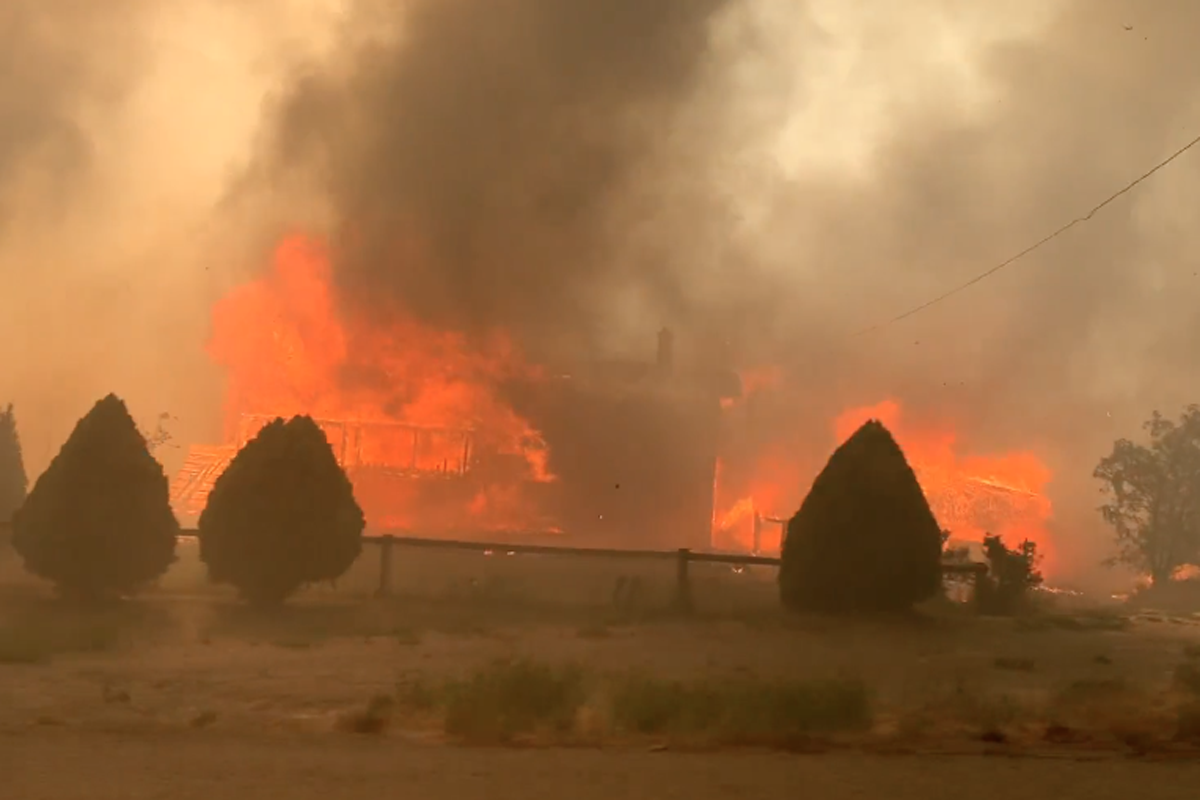 A town in the Canadian province of British Columbia is evacuated after wildfires engulf the area