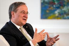 Merkel's likely heir favors her centrist path for Germany