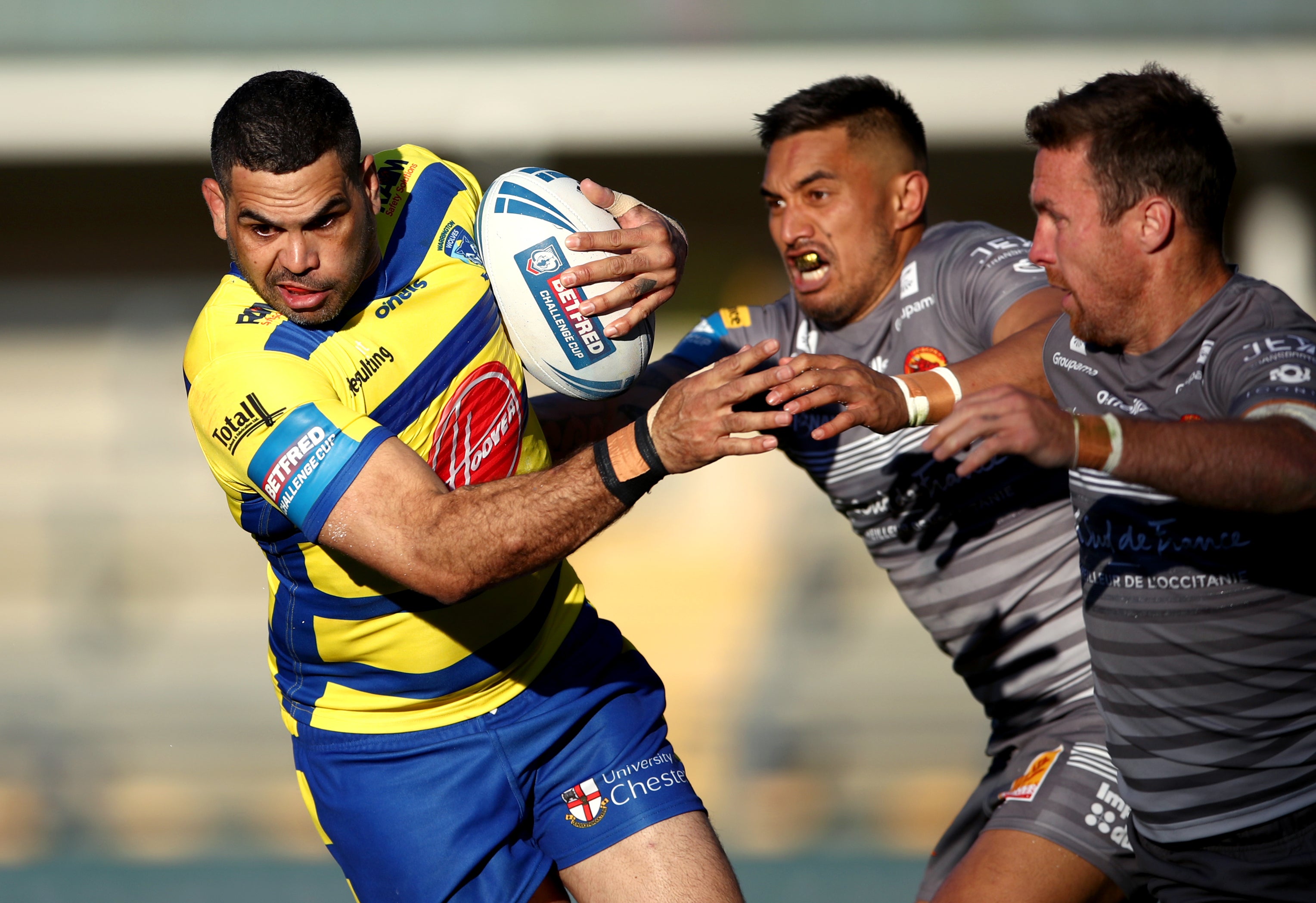 Greg Inglis, left, has been released by Warrington