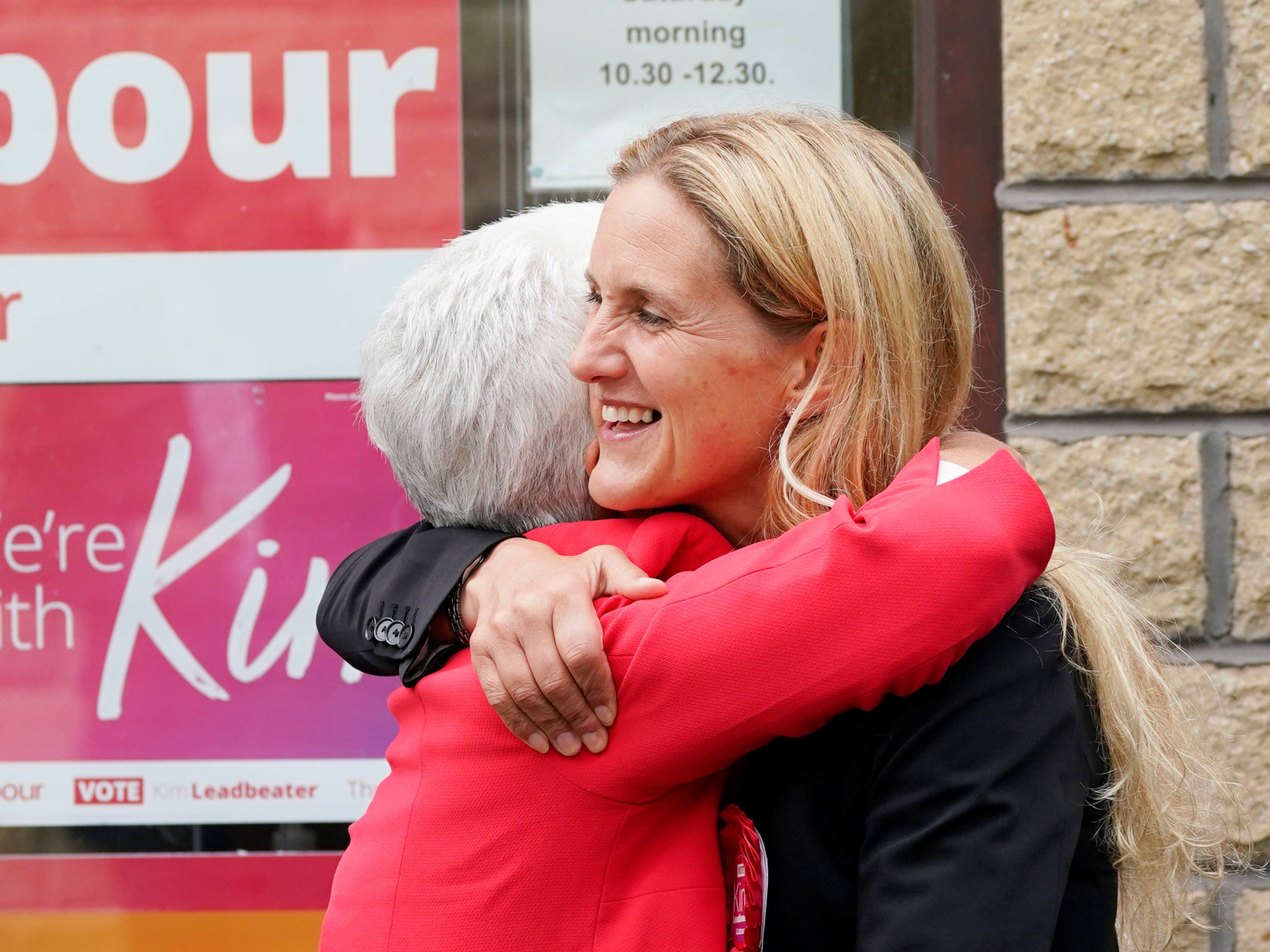 Kim Leadbeater embraces her mother, Jean, in Clackheaton on Friday after she won the Batley and Spen by-election