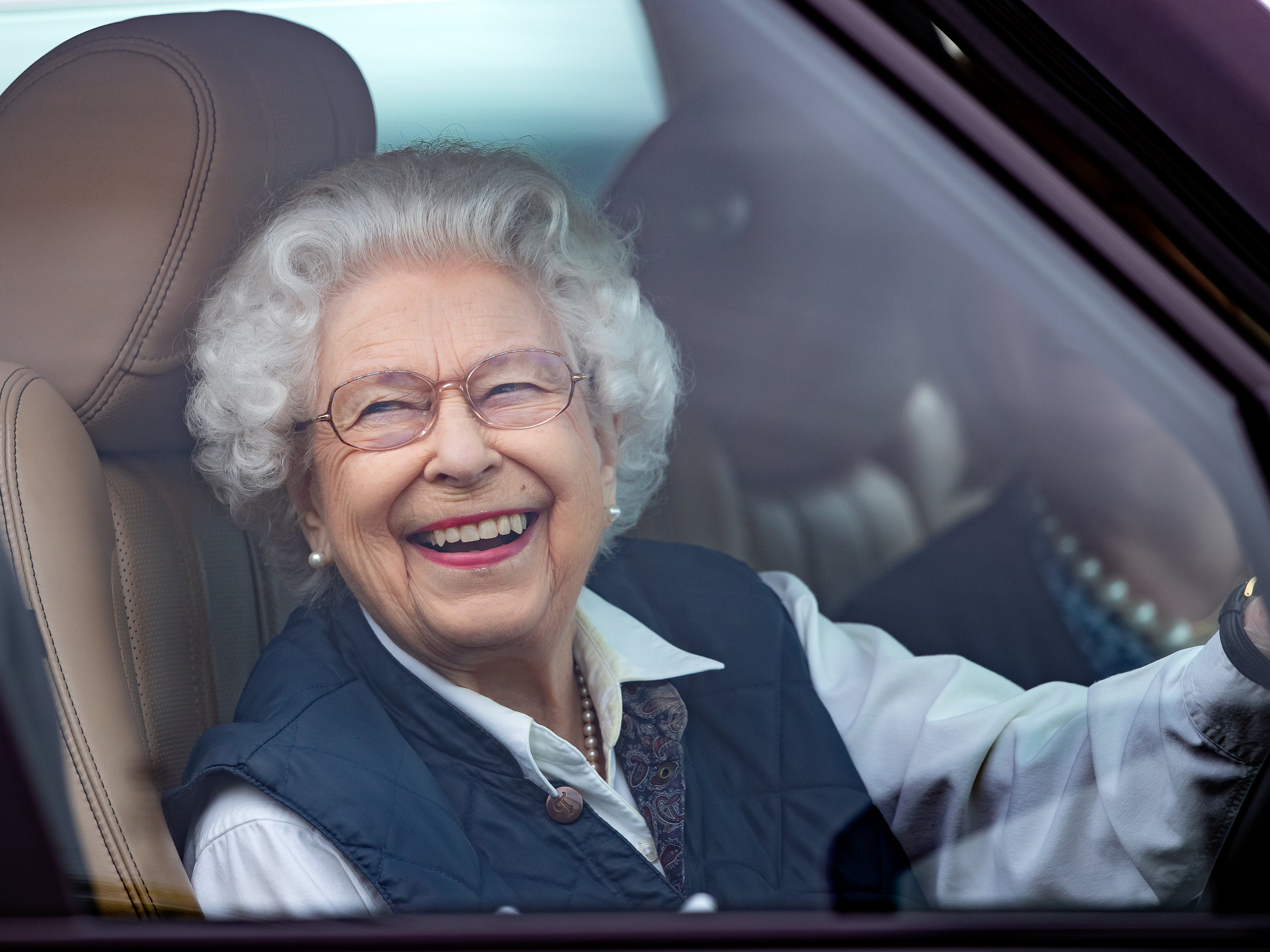 Queen Elizabeth II seen driving her Range Rover car as she attends day 2 of the Royal Windsor Horse Show in Home Park, Windsor Castle