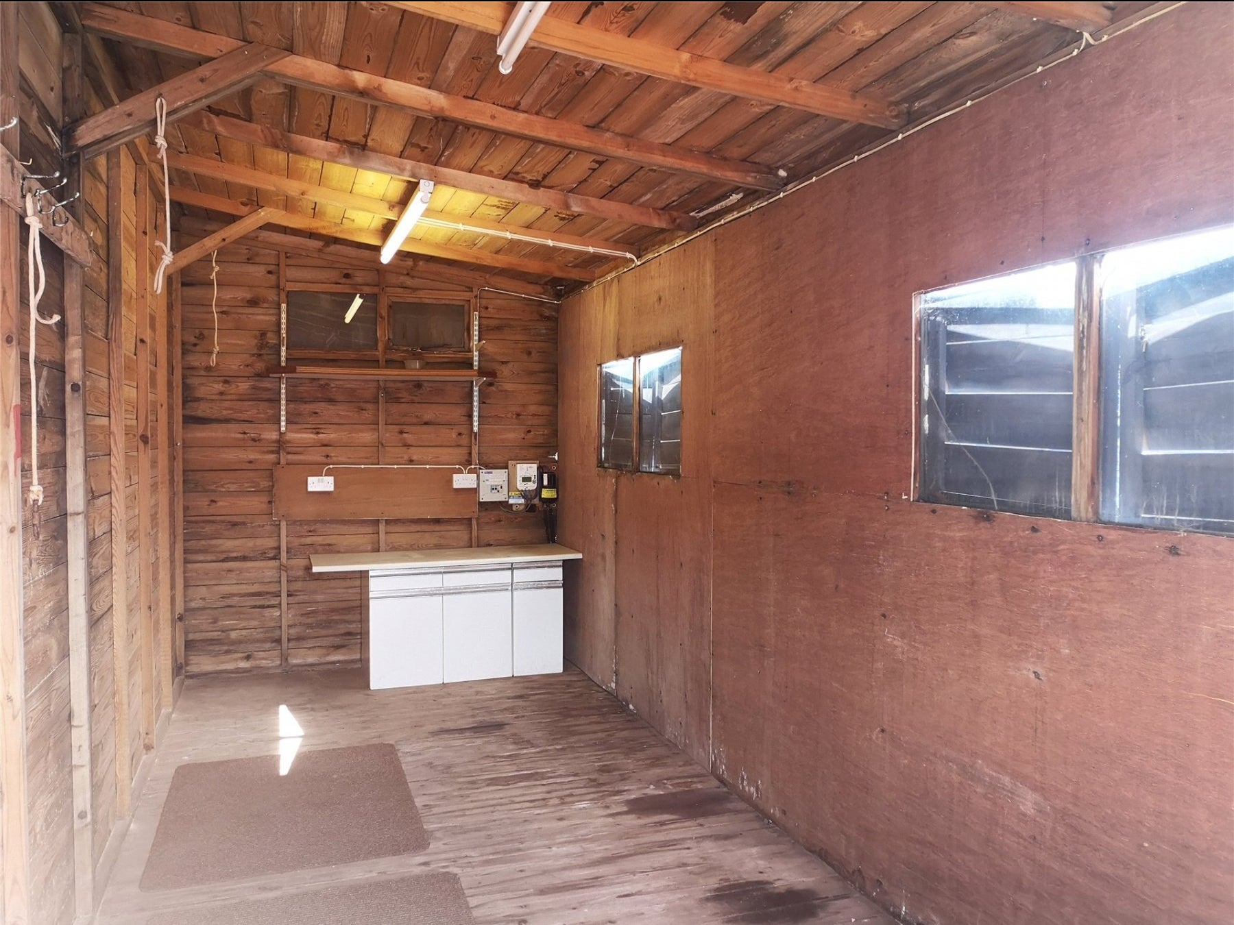 Interior of the wooden beach hut near River Beach in Teignmouth, Devon