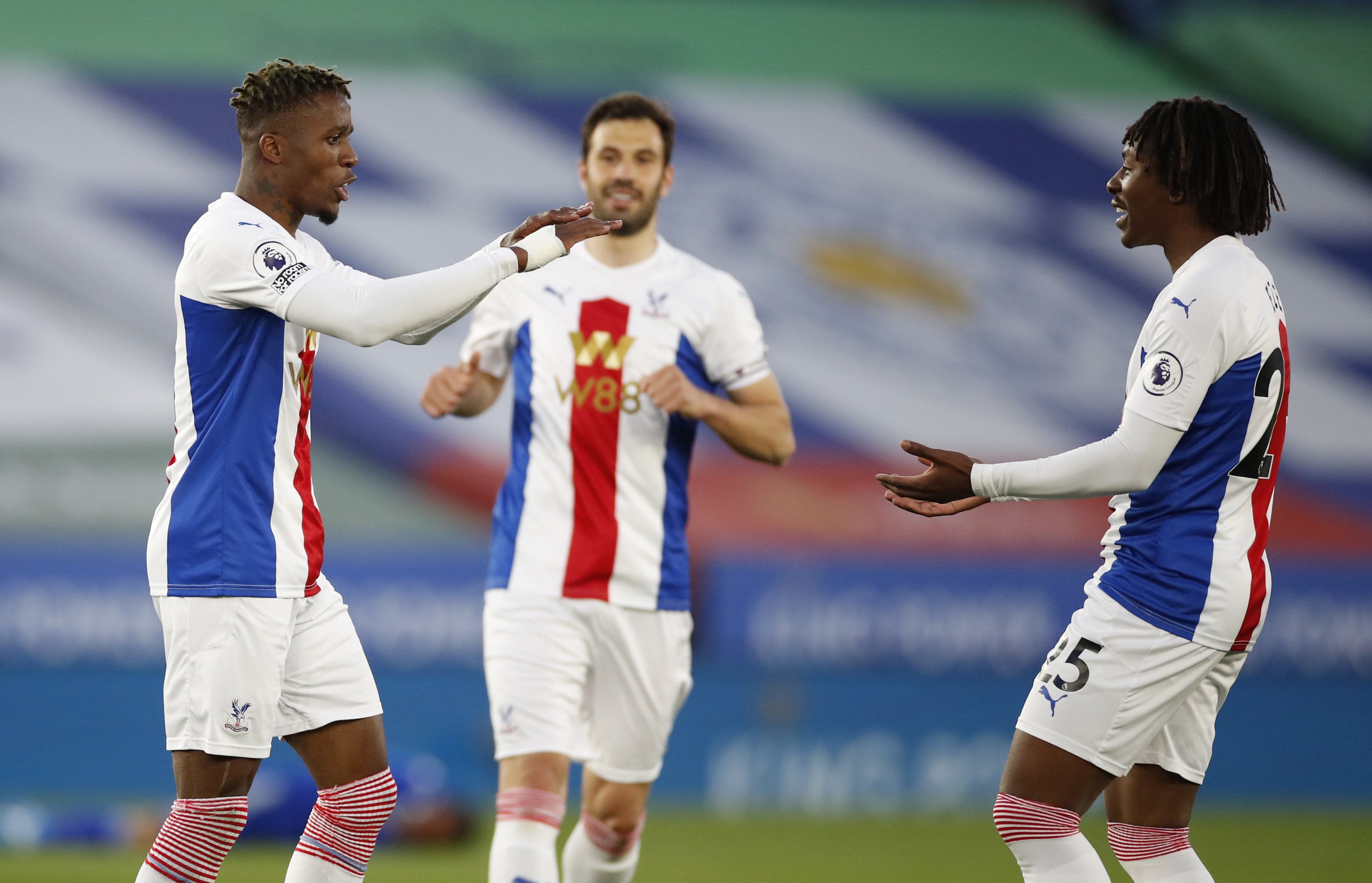 Wilfried Zaha and Ebere Eze in action for Crystal Palace