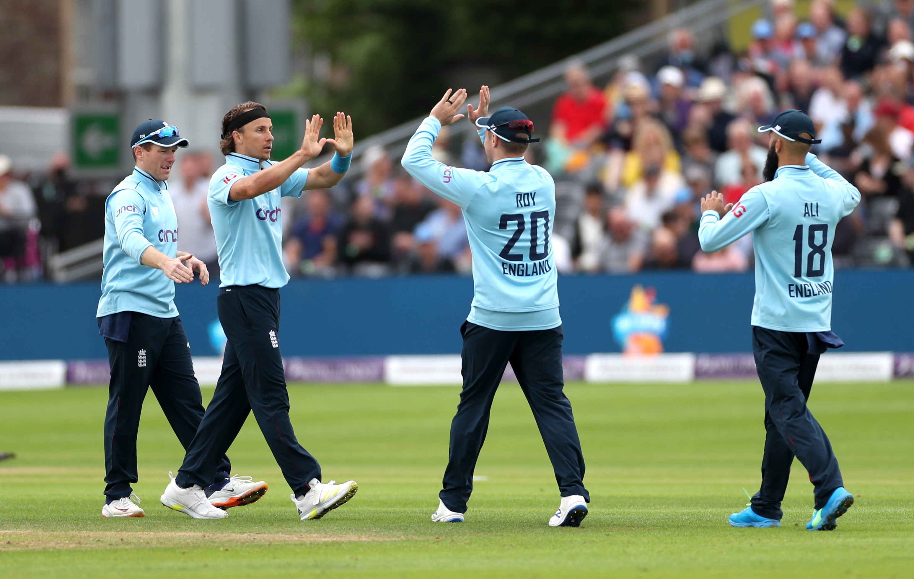 Tom Curran celebrates with his England team-mates