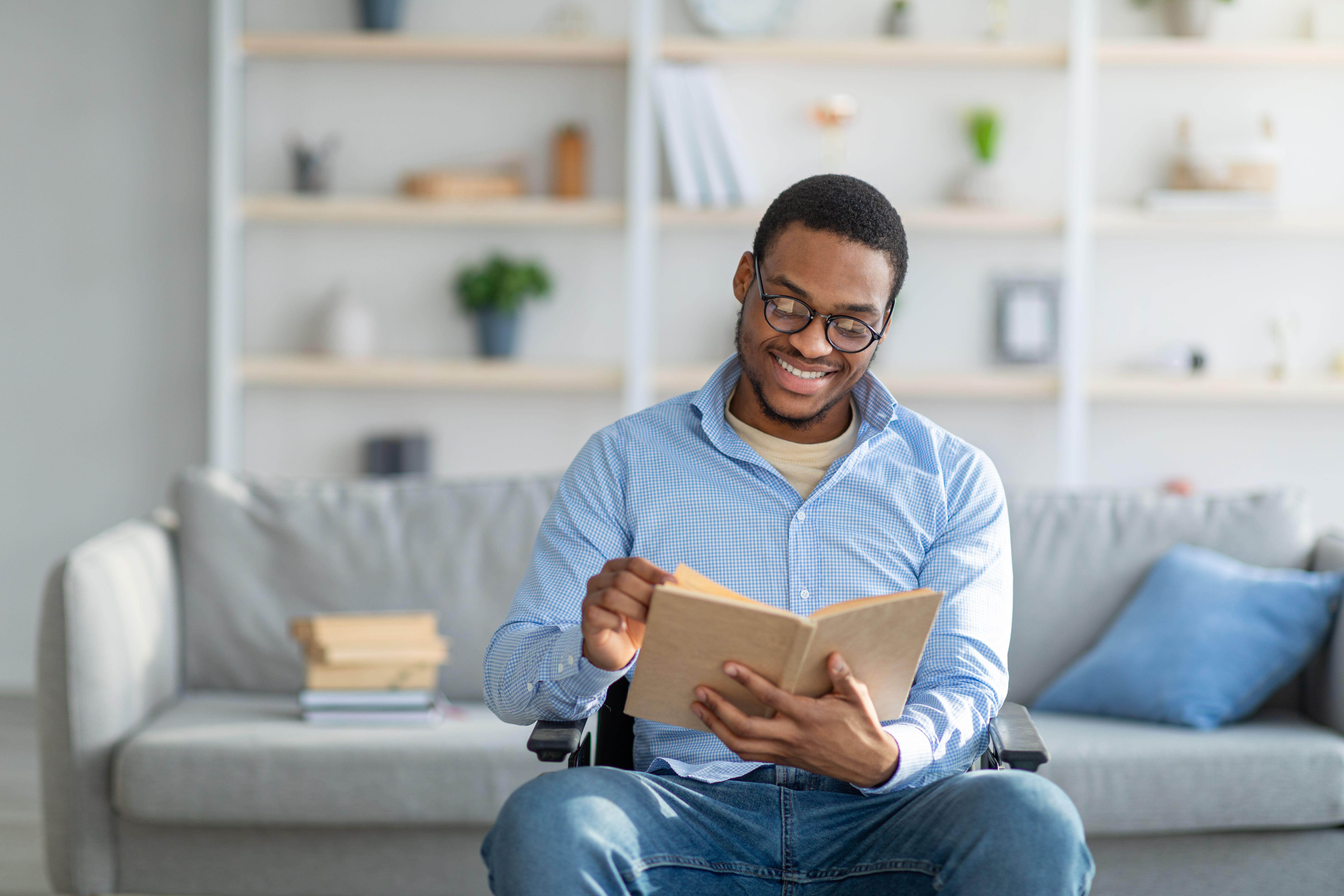 Man reading at home