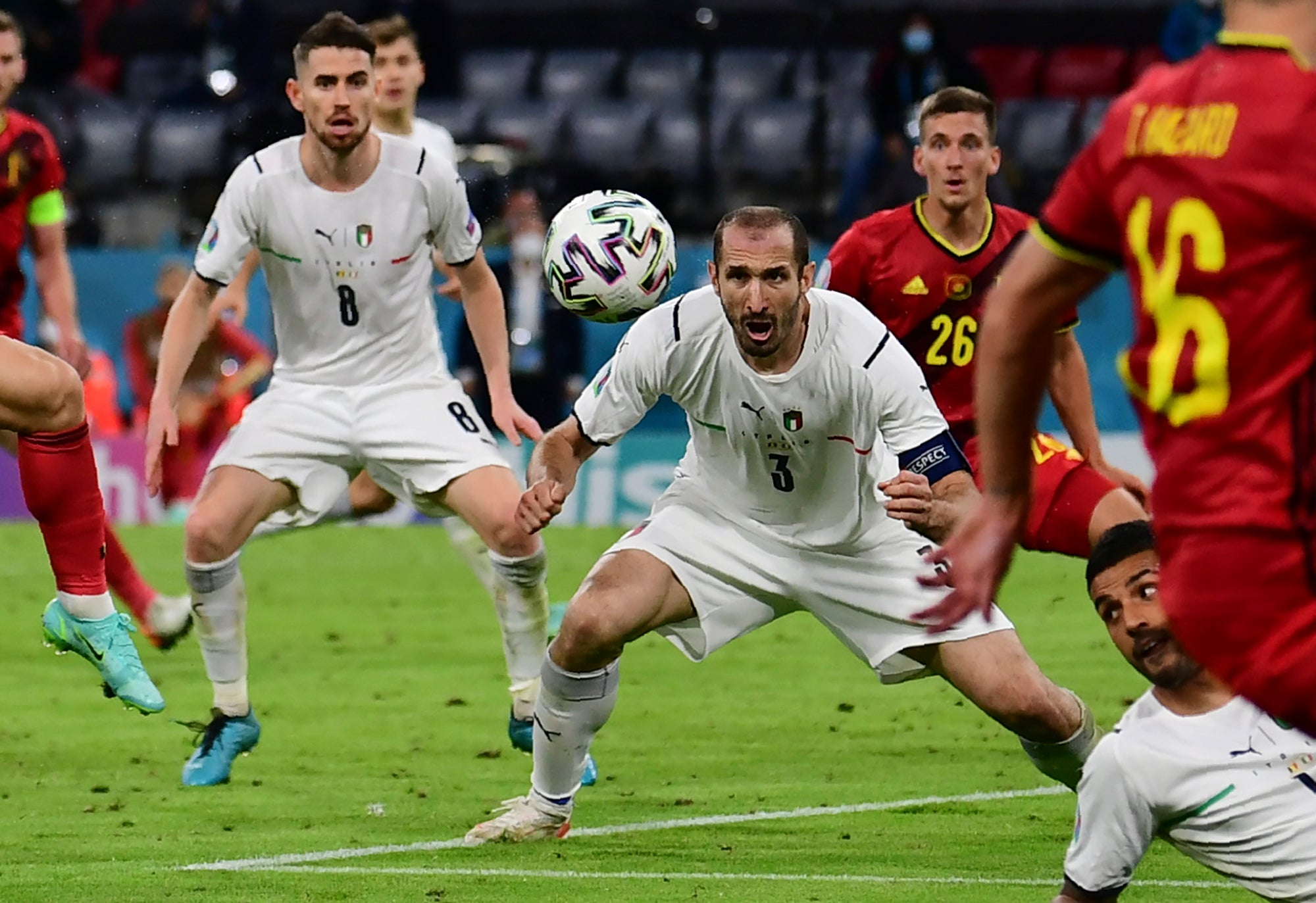 Italy’s Giorgio Chiellini stoops to head the ball