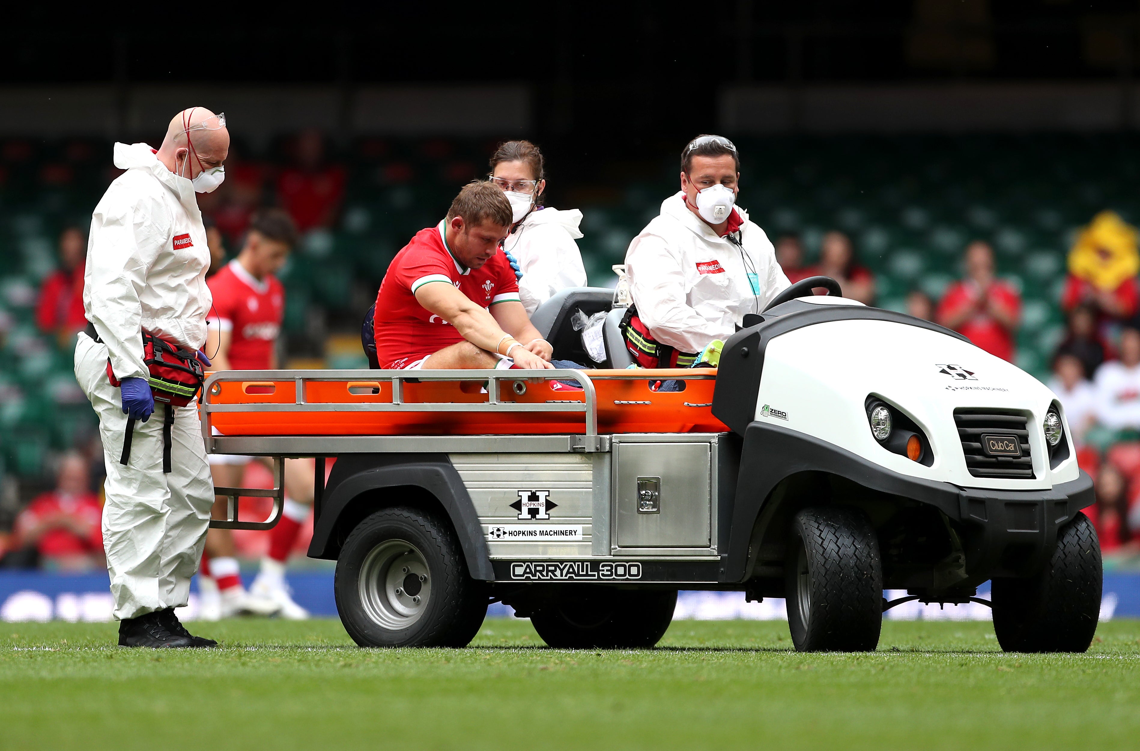 Leigh Halfpenny being taken off on a stretcher cart