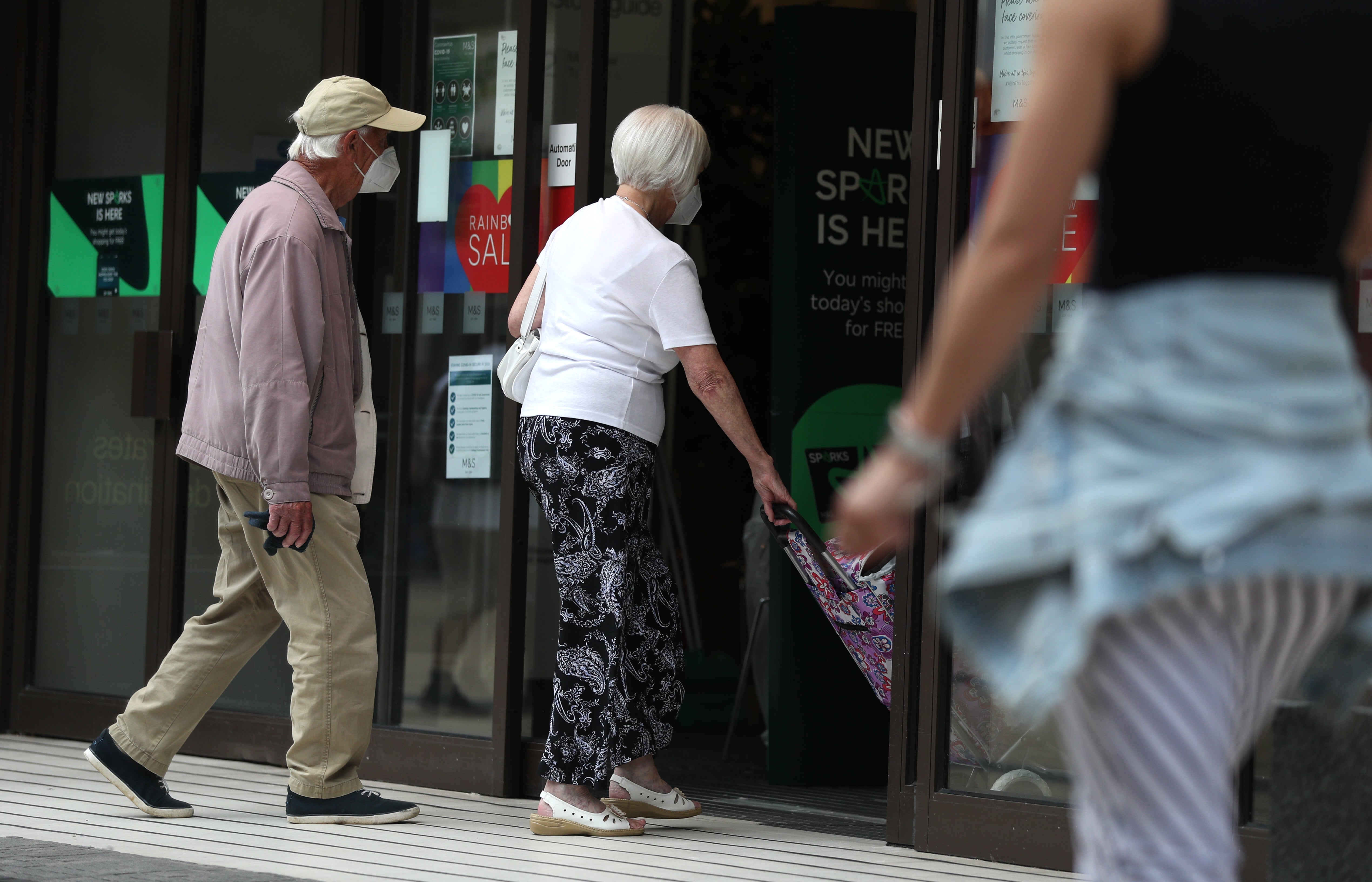 Customers outside a supermarket