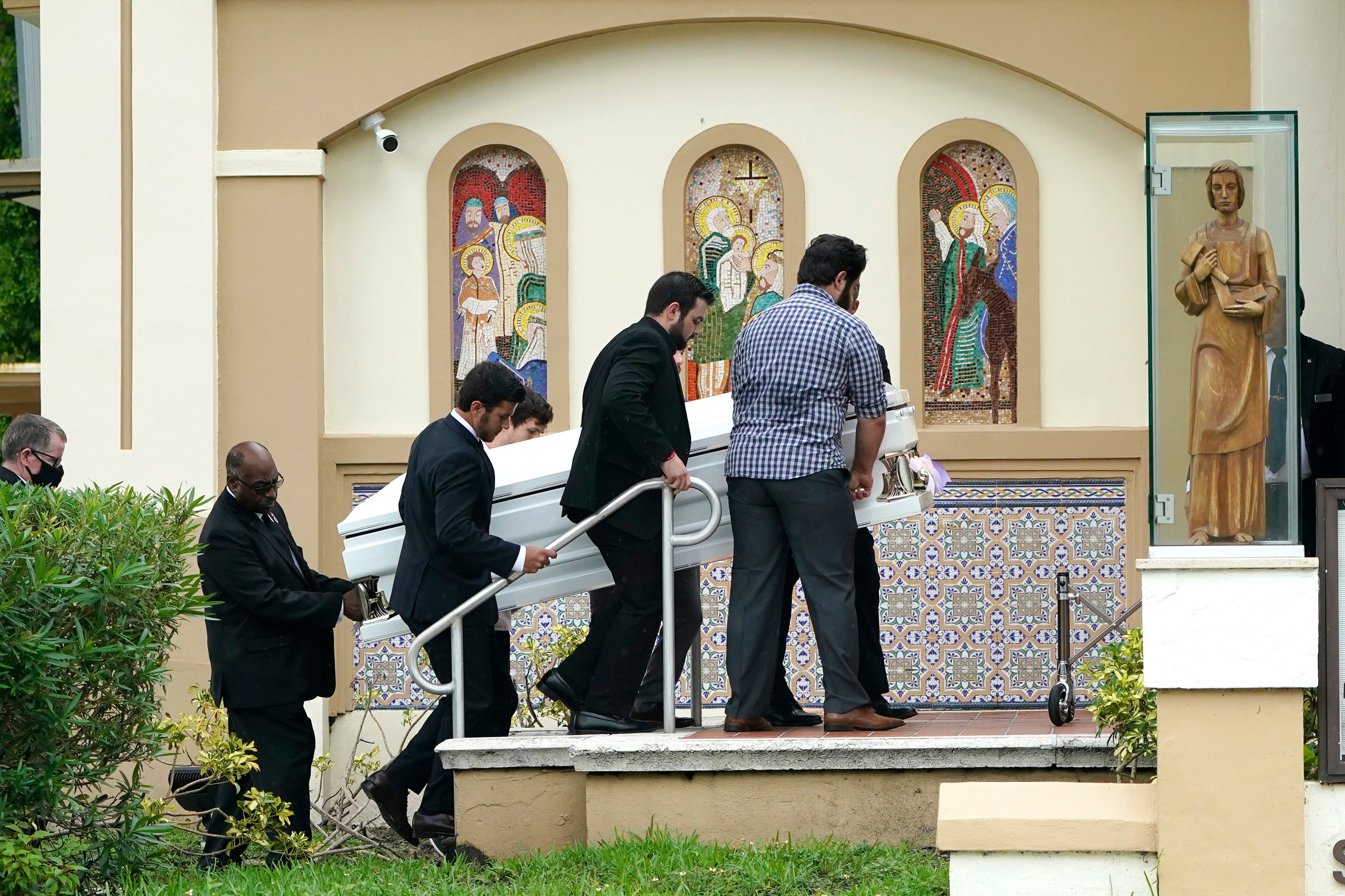 APTOPIX Building Collapse Miami Guara Funeral