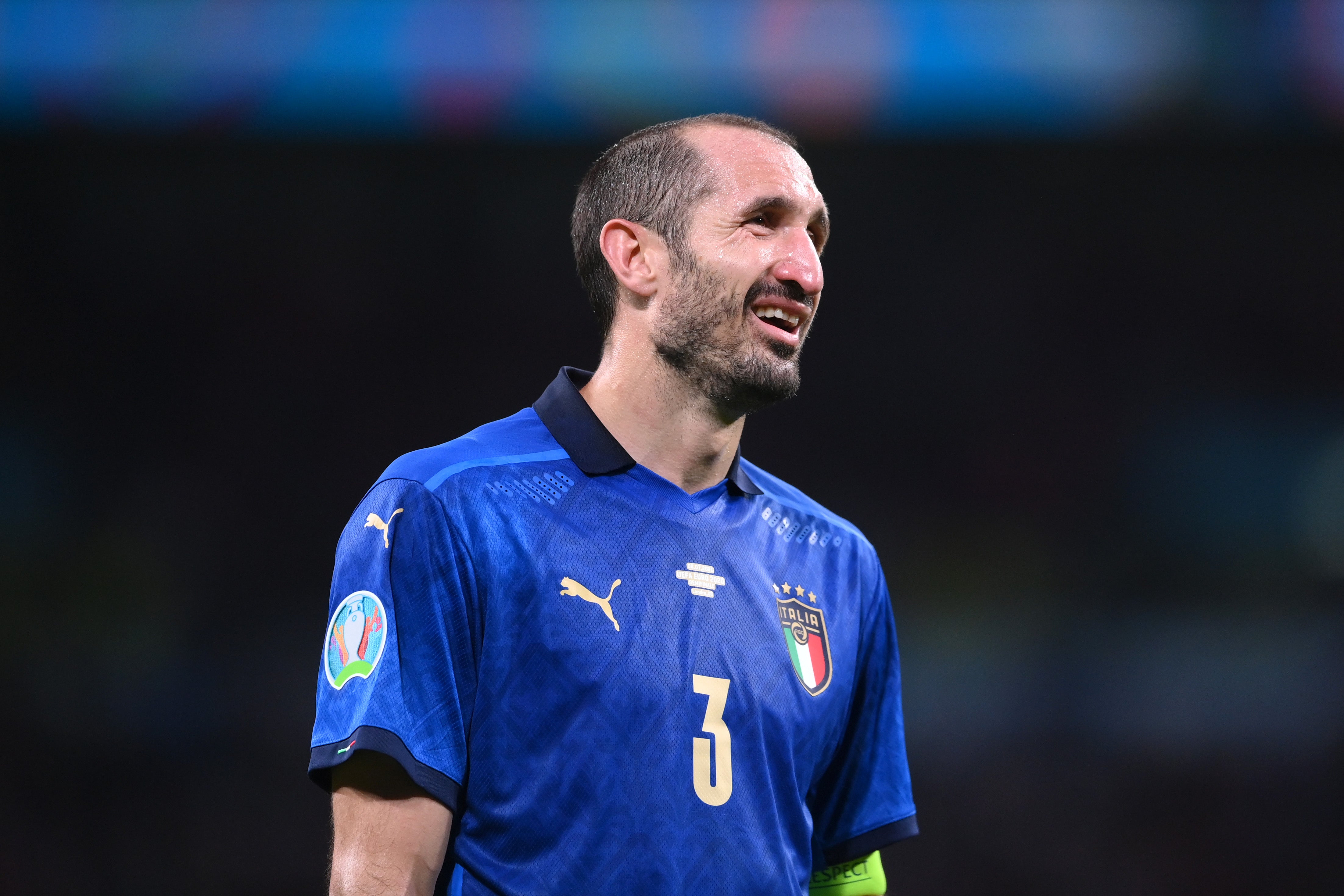 Giorgio Chiellini of Italy looks tired during the semi-final against Spain