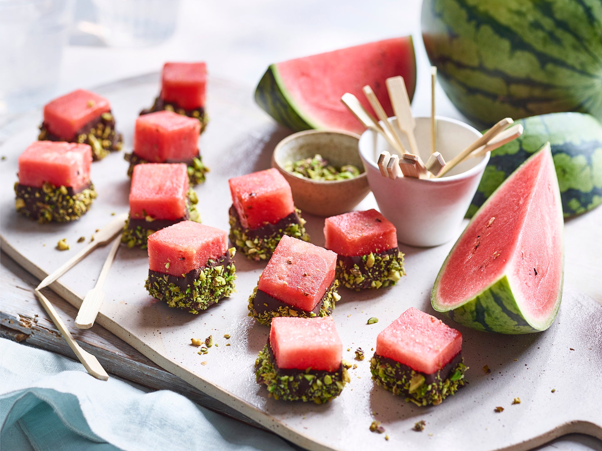 Make these chocolate-dipped watermelon bites ahead and freeze for when you need last minute sweet treats