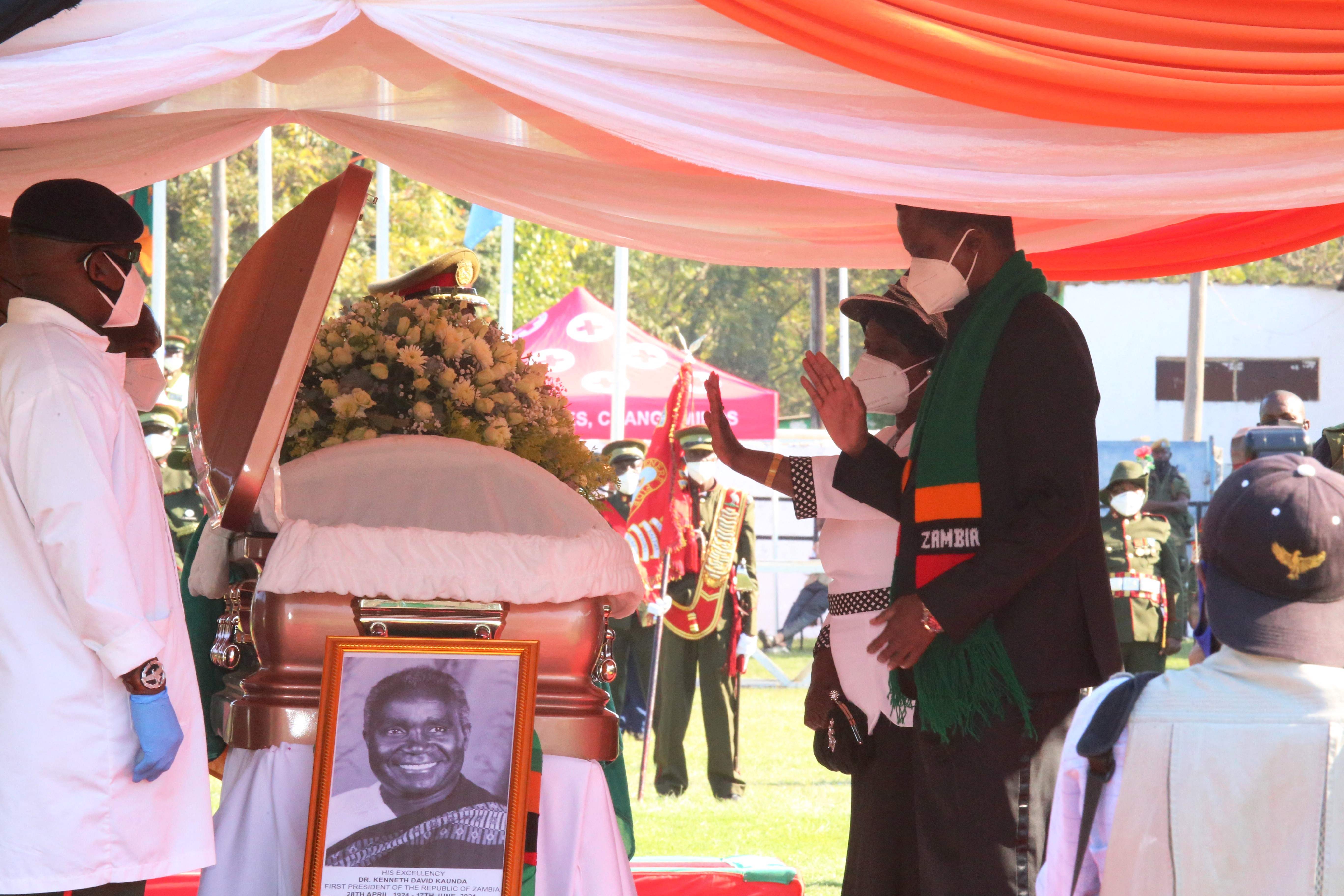 Zambian President Edgar Lungu and First Lady pay their respects to the late former Zambian President Kenneth Kaunda during his state memorial service on 2 July 2021