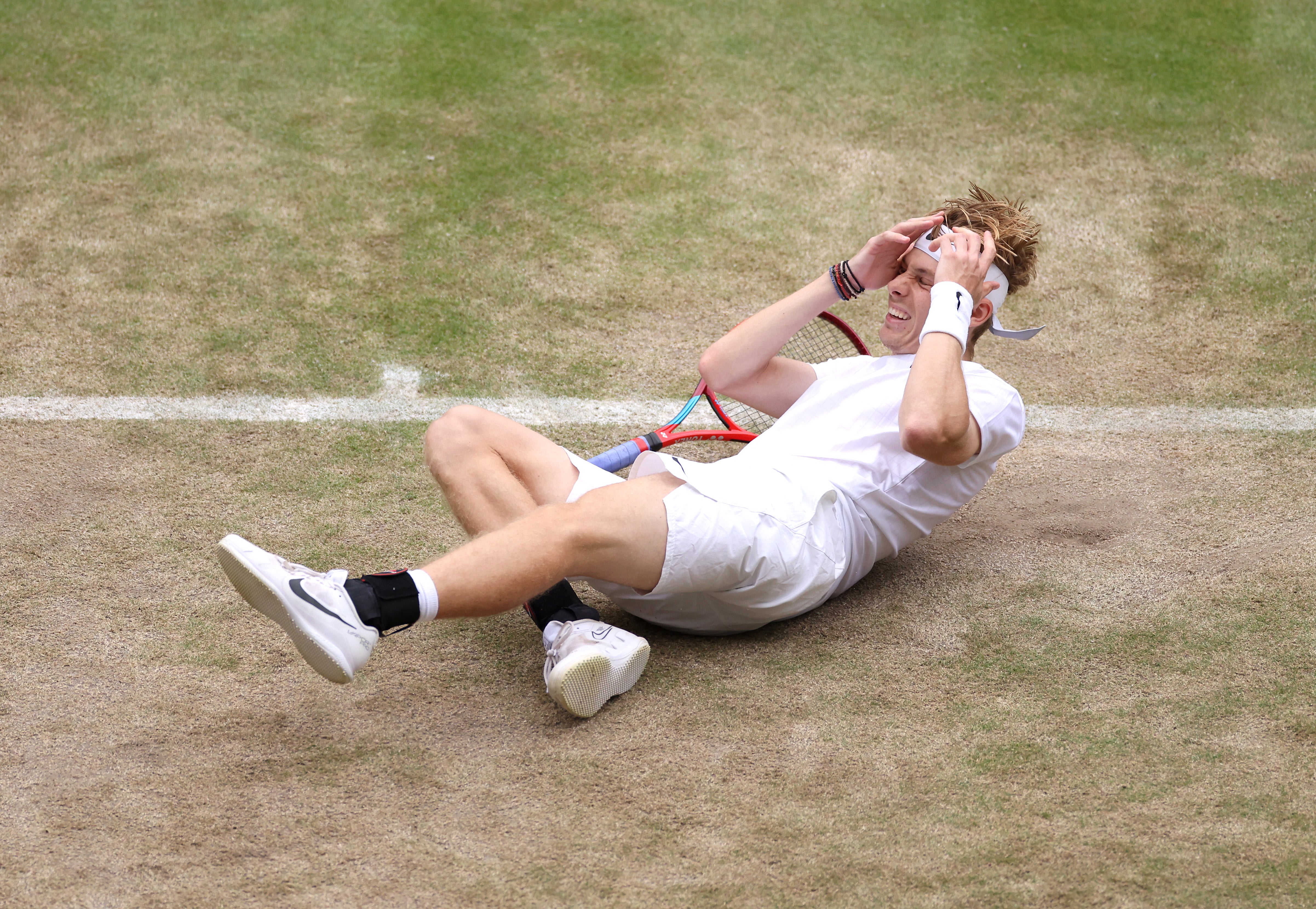 Denis Shapovalov reacts to his win