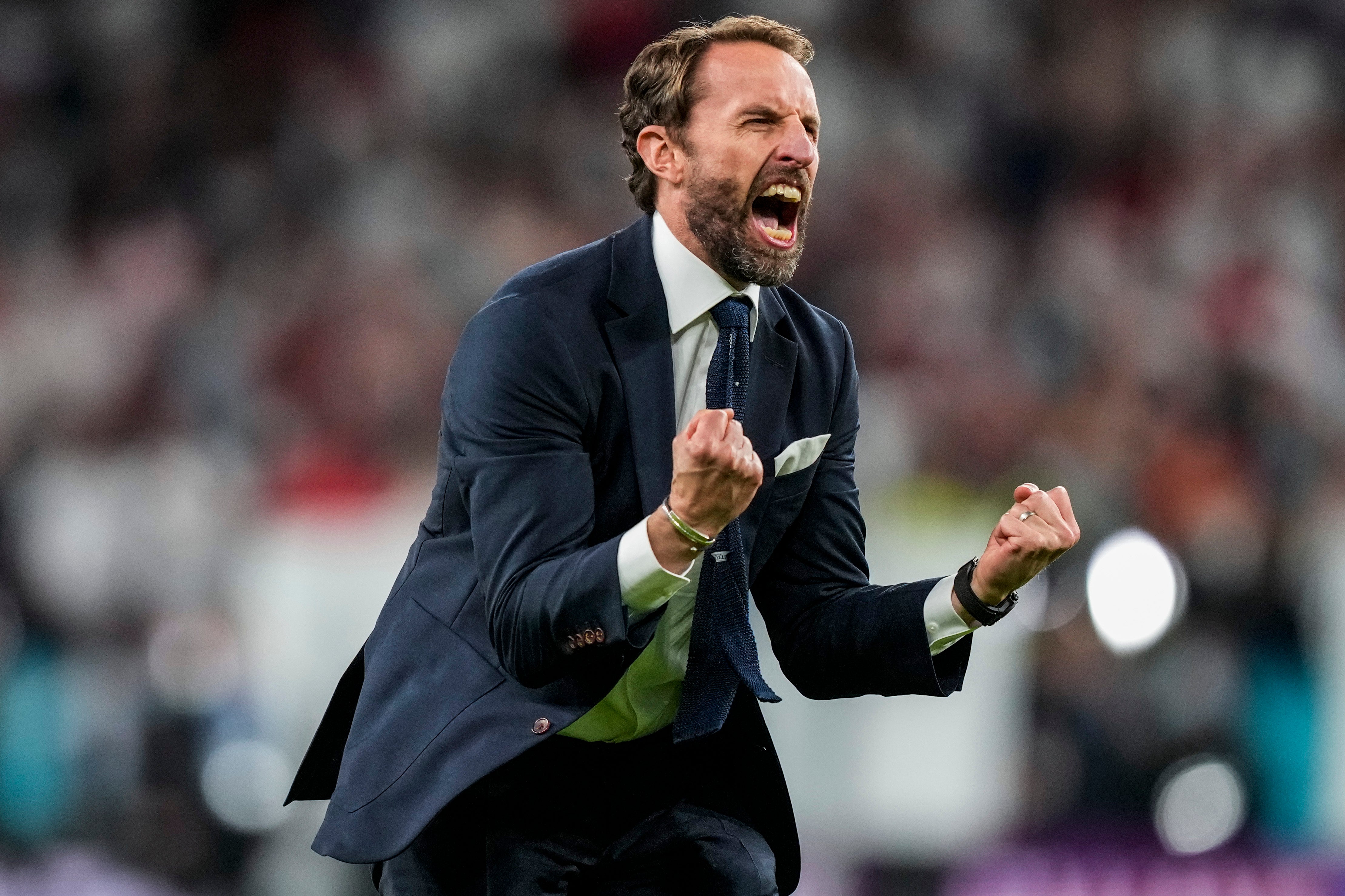 Gareth Southgate celebrates a famous win at Wembley