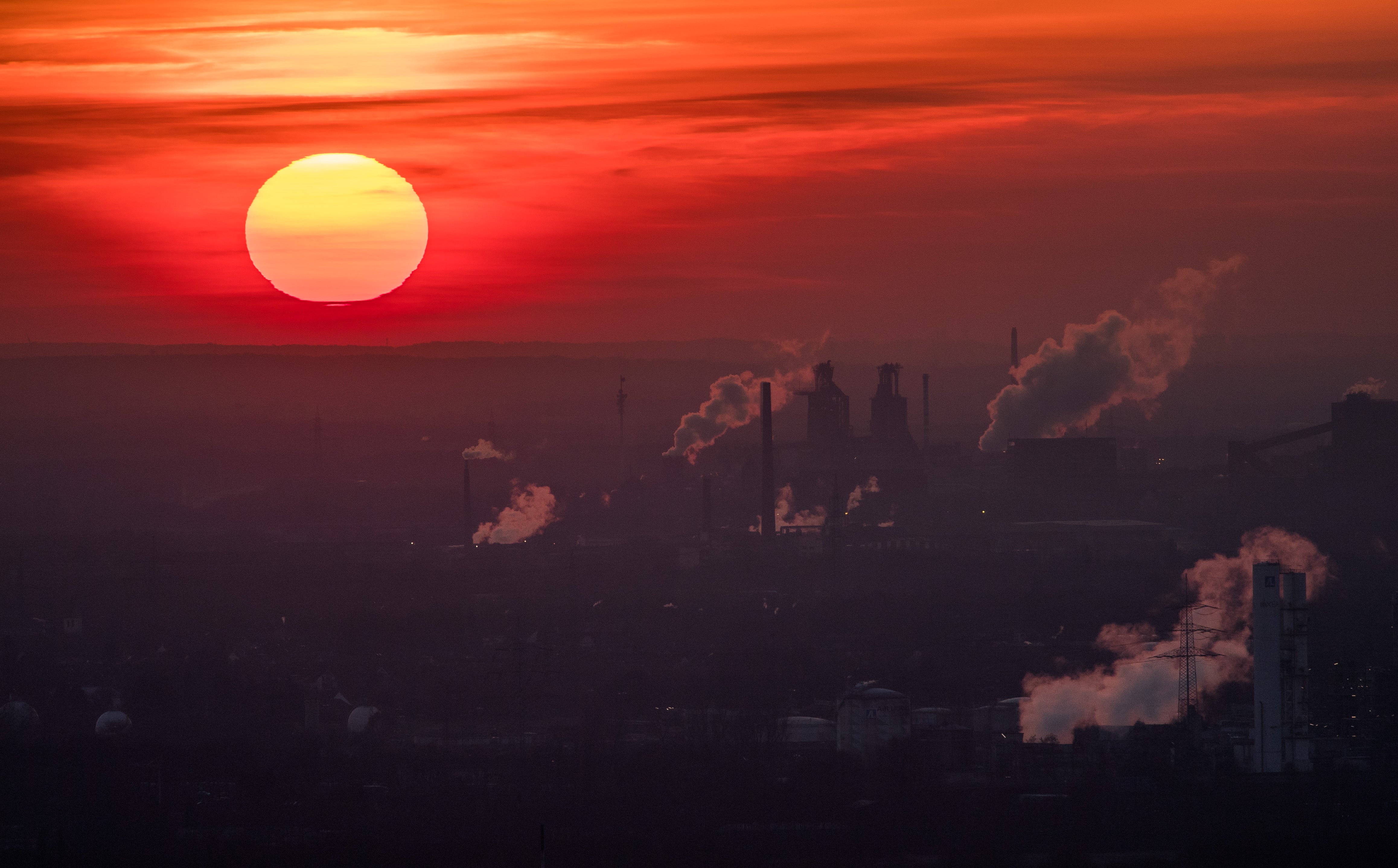 Steam and exhaust seen on a cold winter day on 6 January 2017 in Oberhausen, Germany