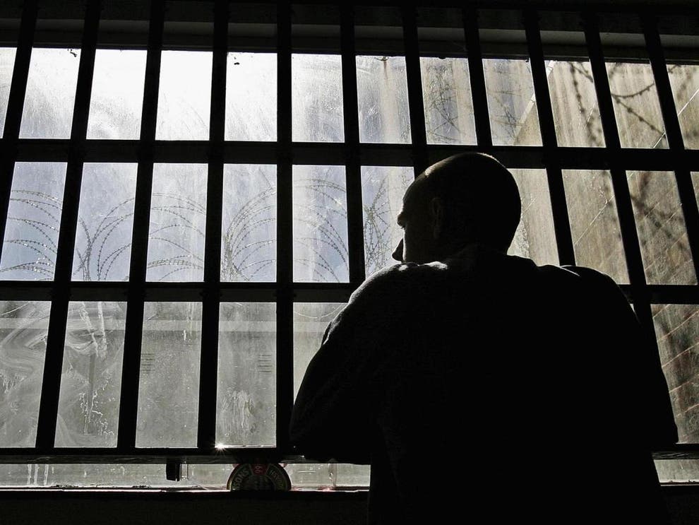 Representational image of a man in prison