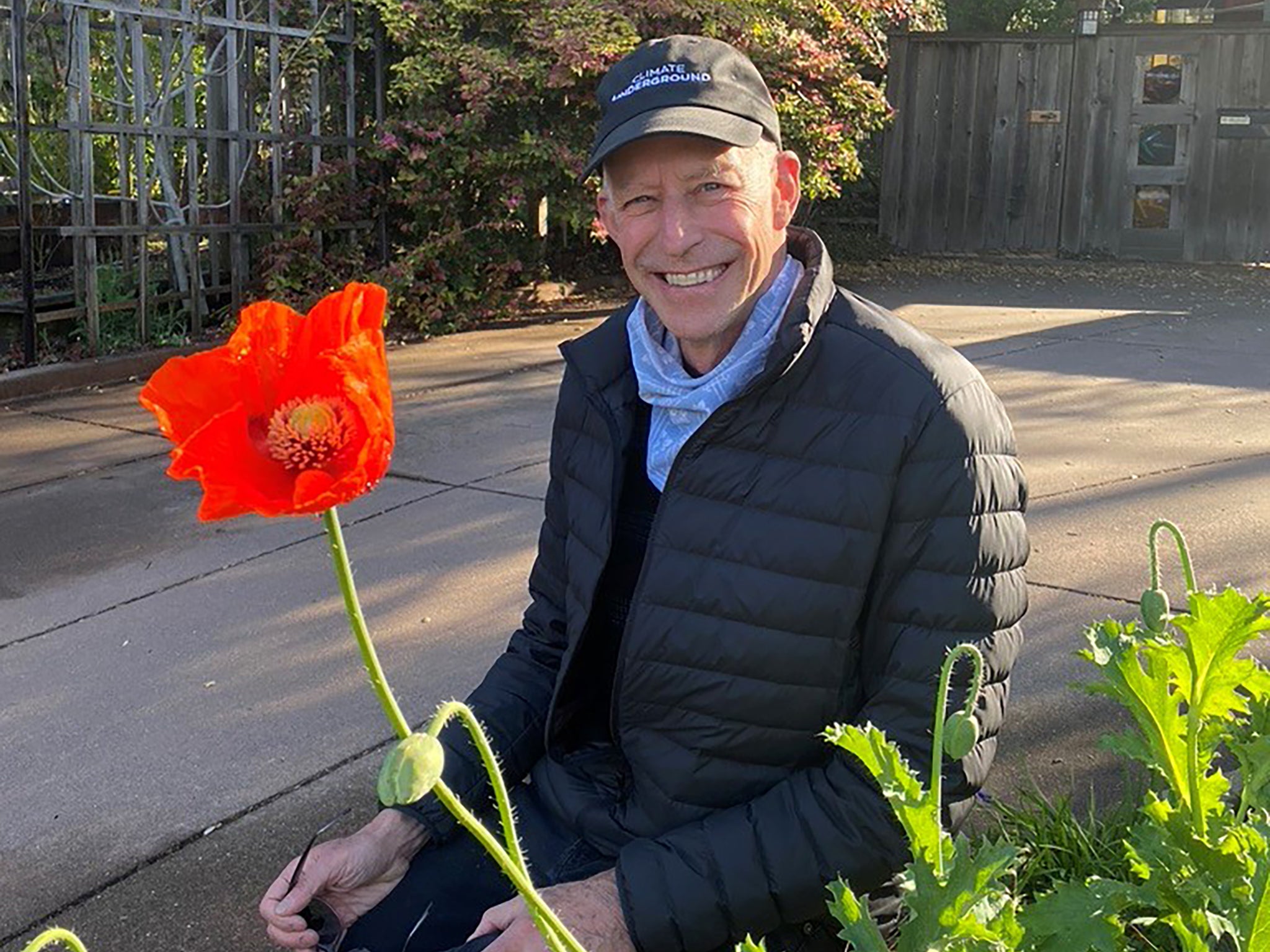 Pollan with an opium poppy earlier this year