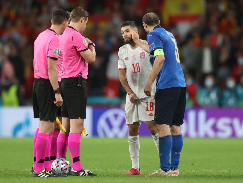 Chiellini with Jordi Alba after the coin toss prior to the penalty shootout