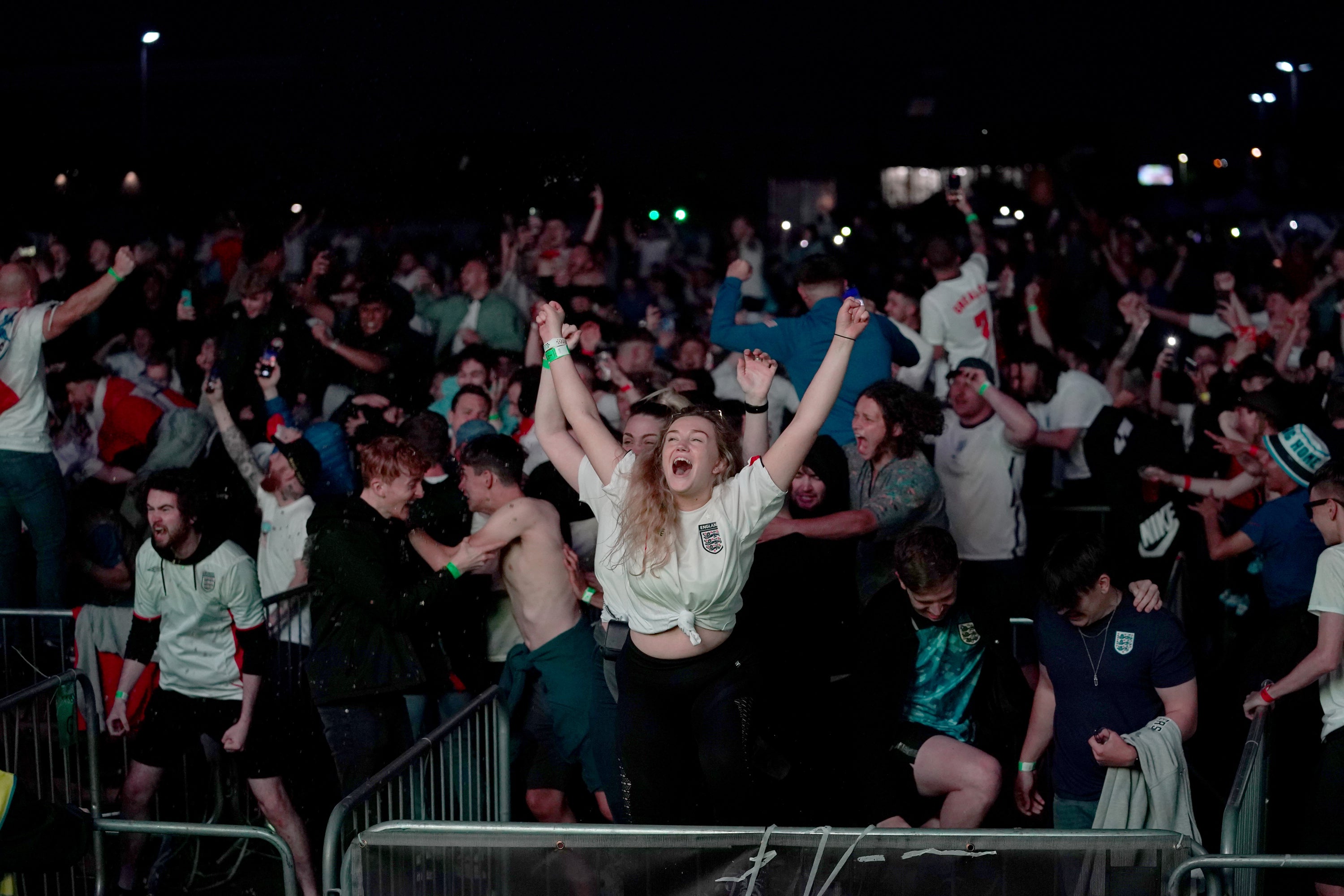 Fans in Manchester celebrate England qualifying for the Euro 2020 final