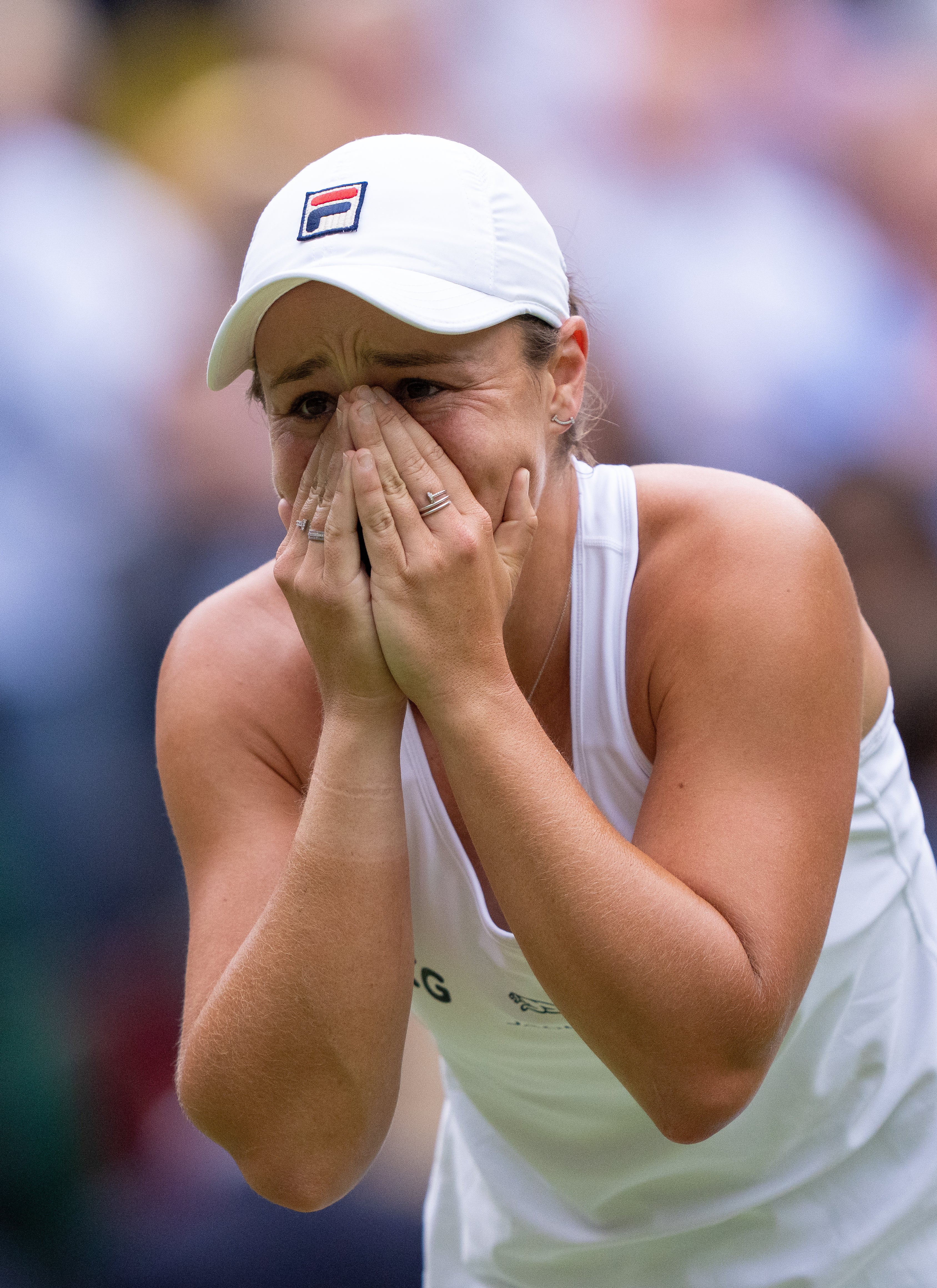 Ashleigh Barty shows her emotion after winning her first Wimbledon title