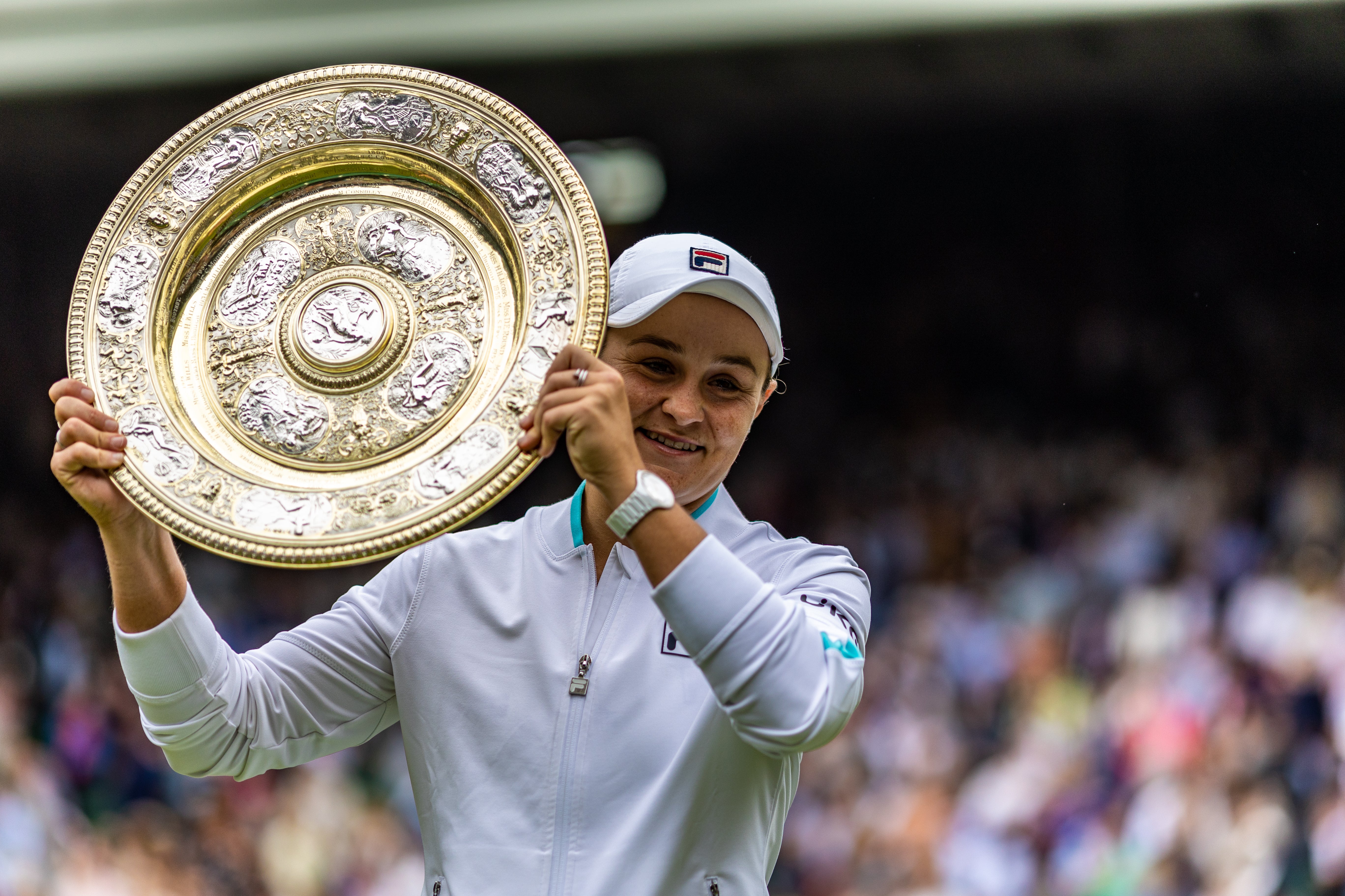 Ashleigh Barty holds aloft the Venus Rosewater Dish