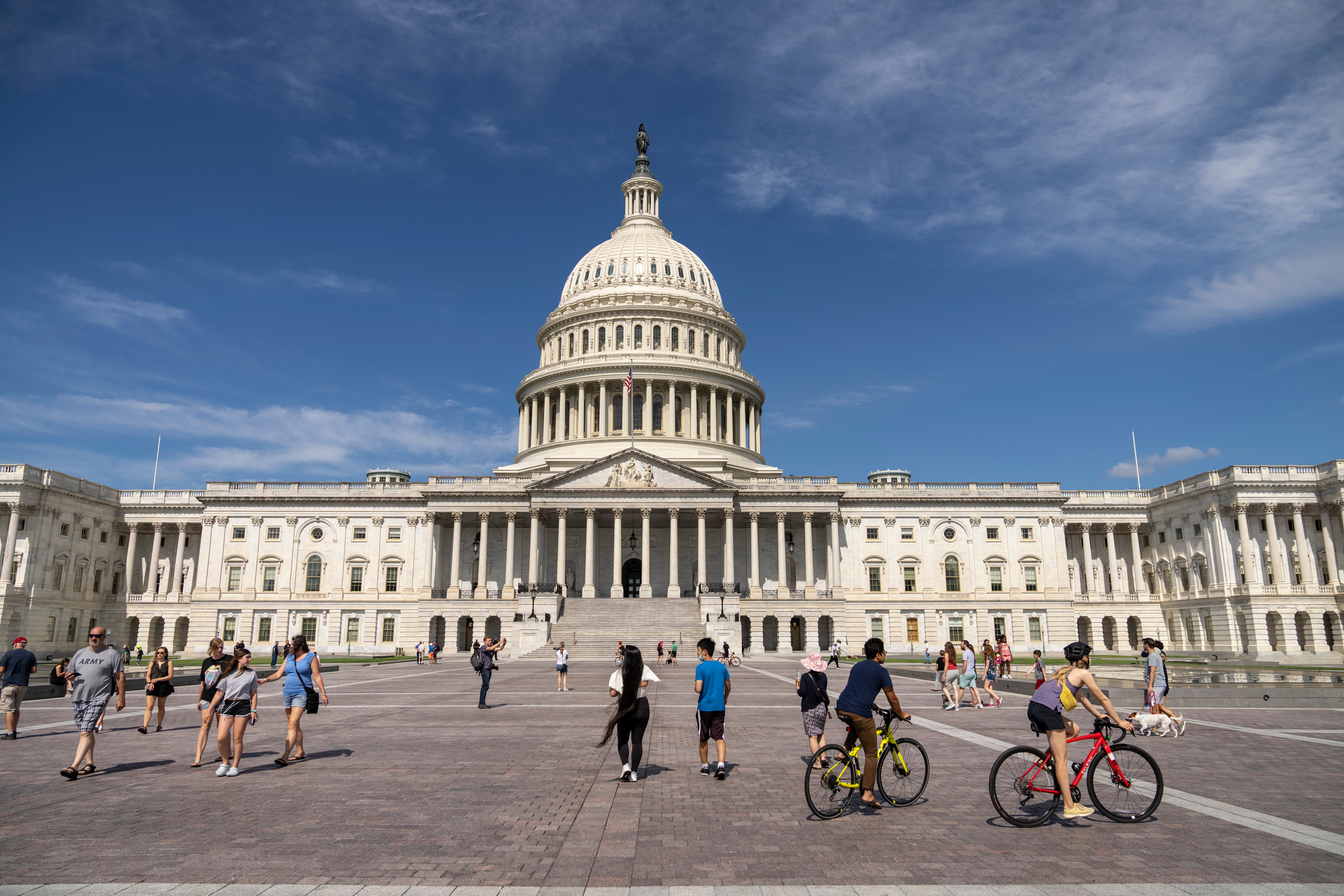 Crowds return to the US Capitol grounds in Washington DC on 10 July after crews removed the final barricades installed after the riot on 6 January.