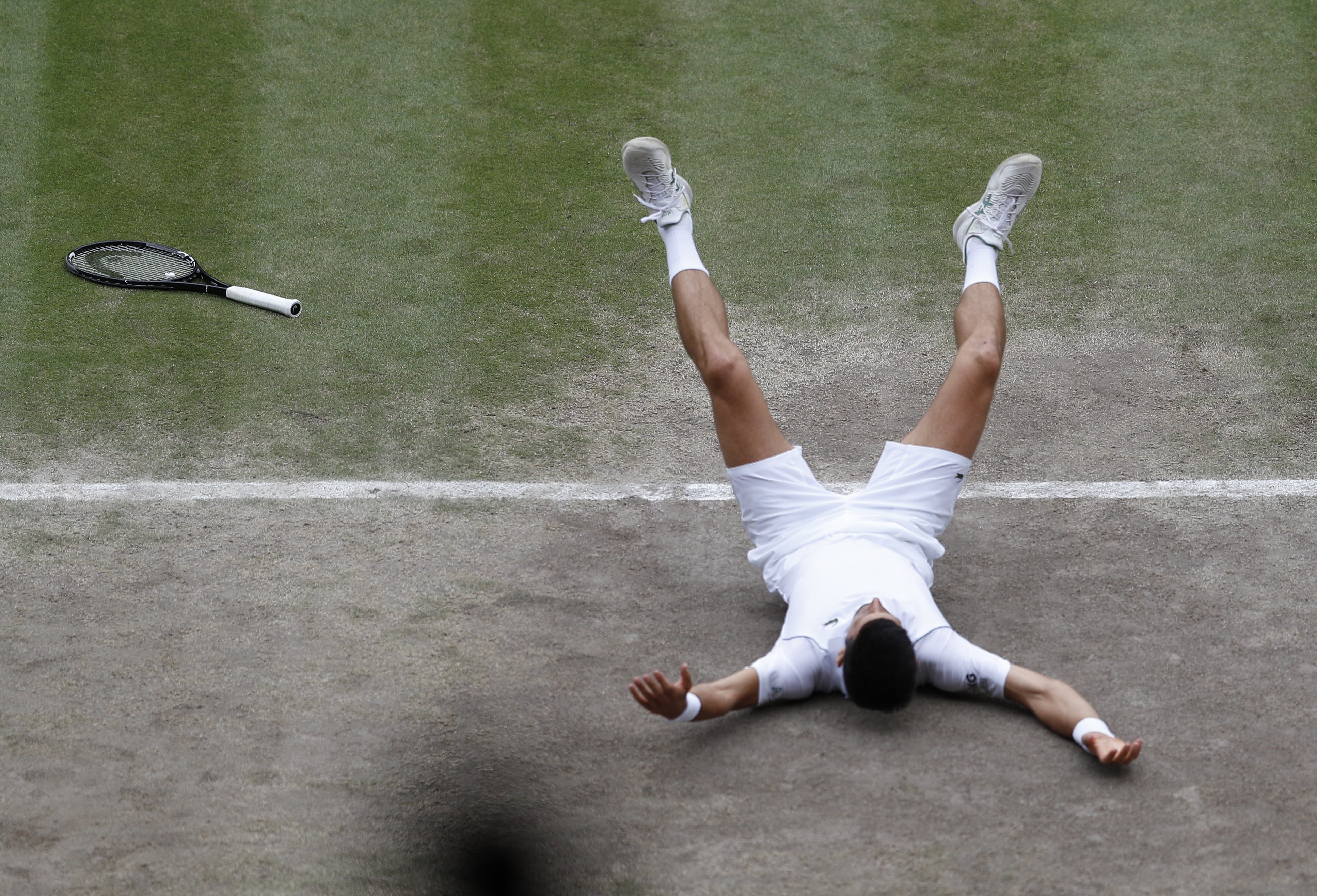 Novak Djokovic reacts to winning