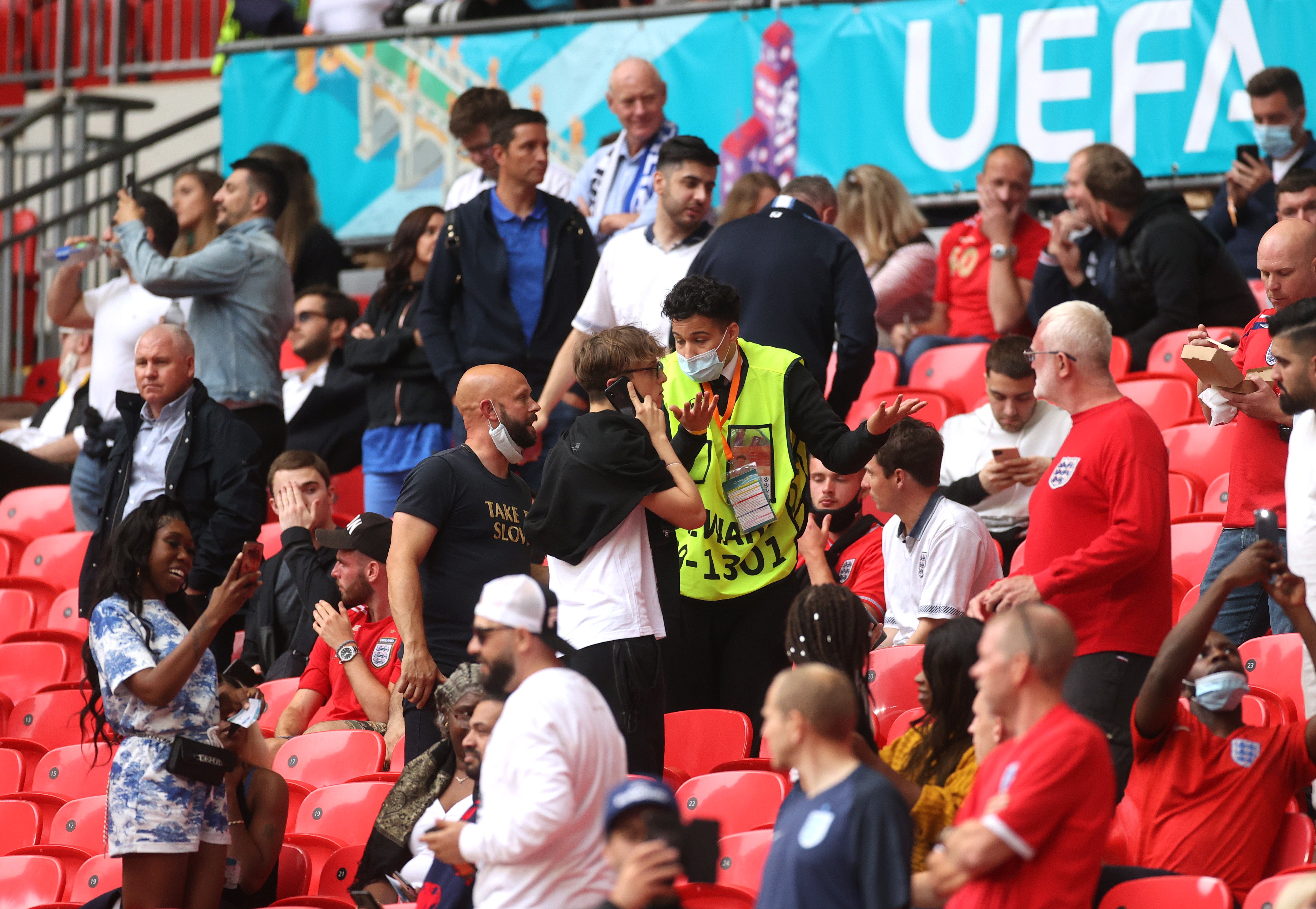 ‘Stewards check fans tickets at Wembley