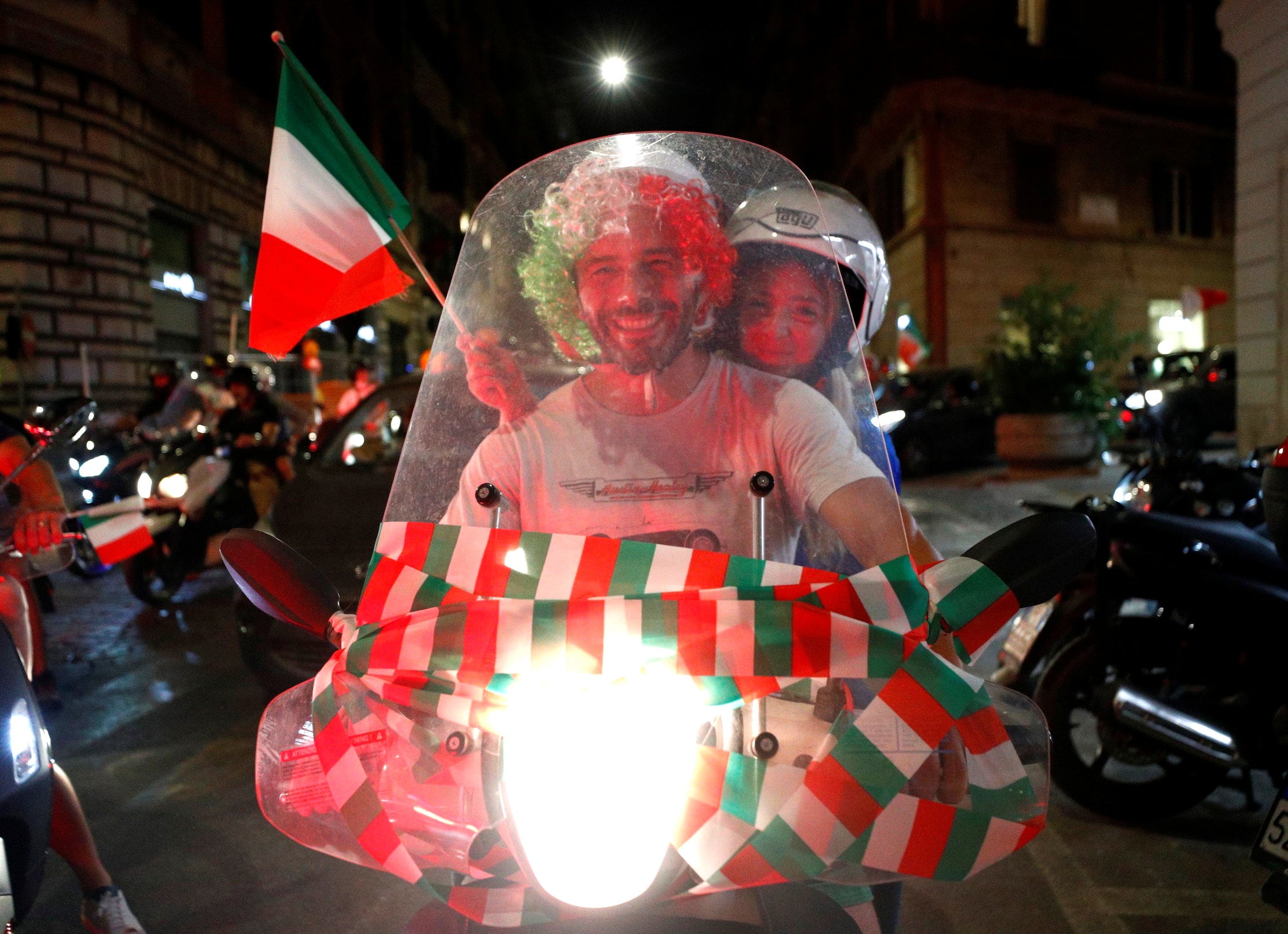 Italy fans in Rome celebrate after winning the Euro 2020 tournament