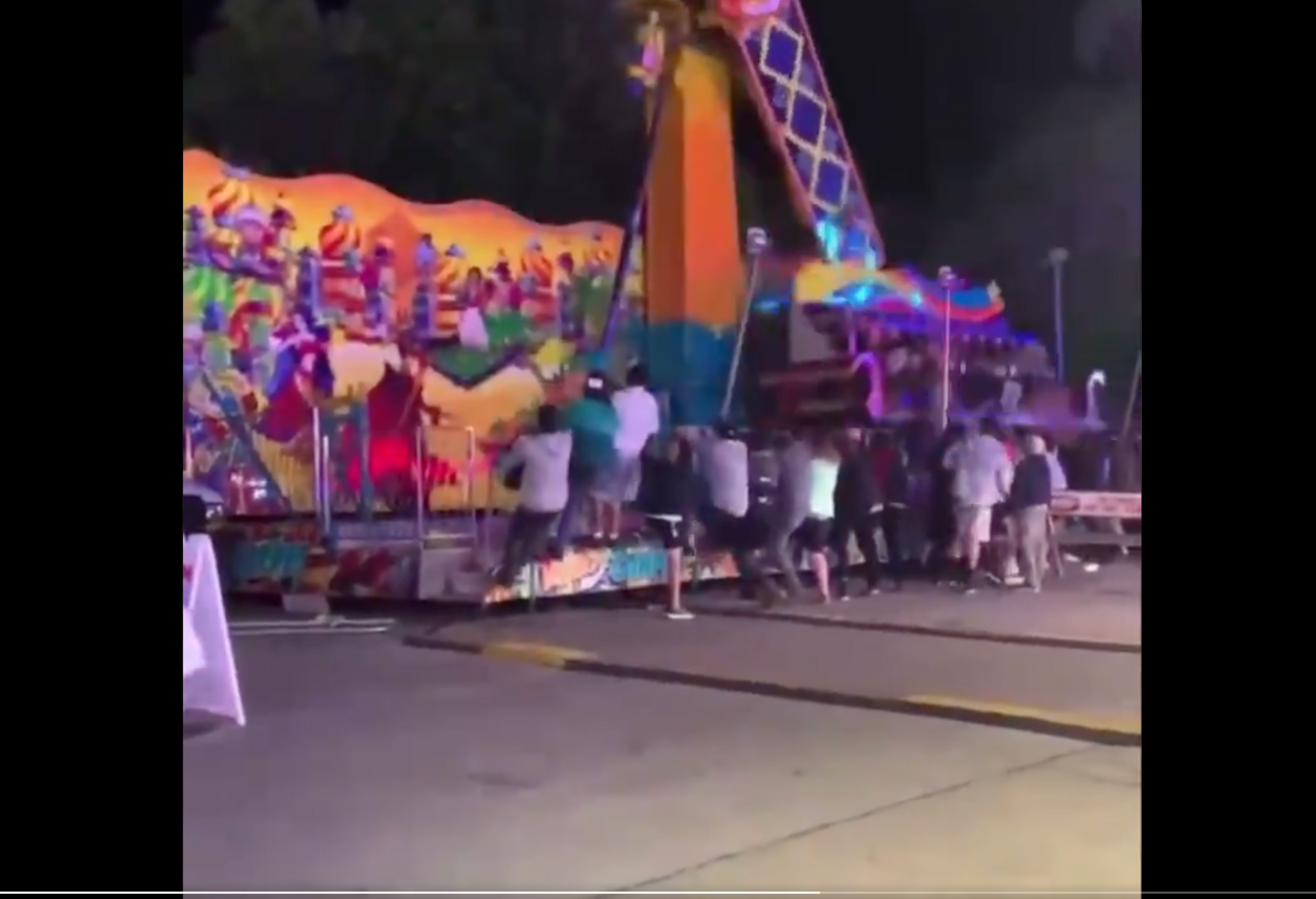 A group of people holding up the ride