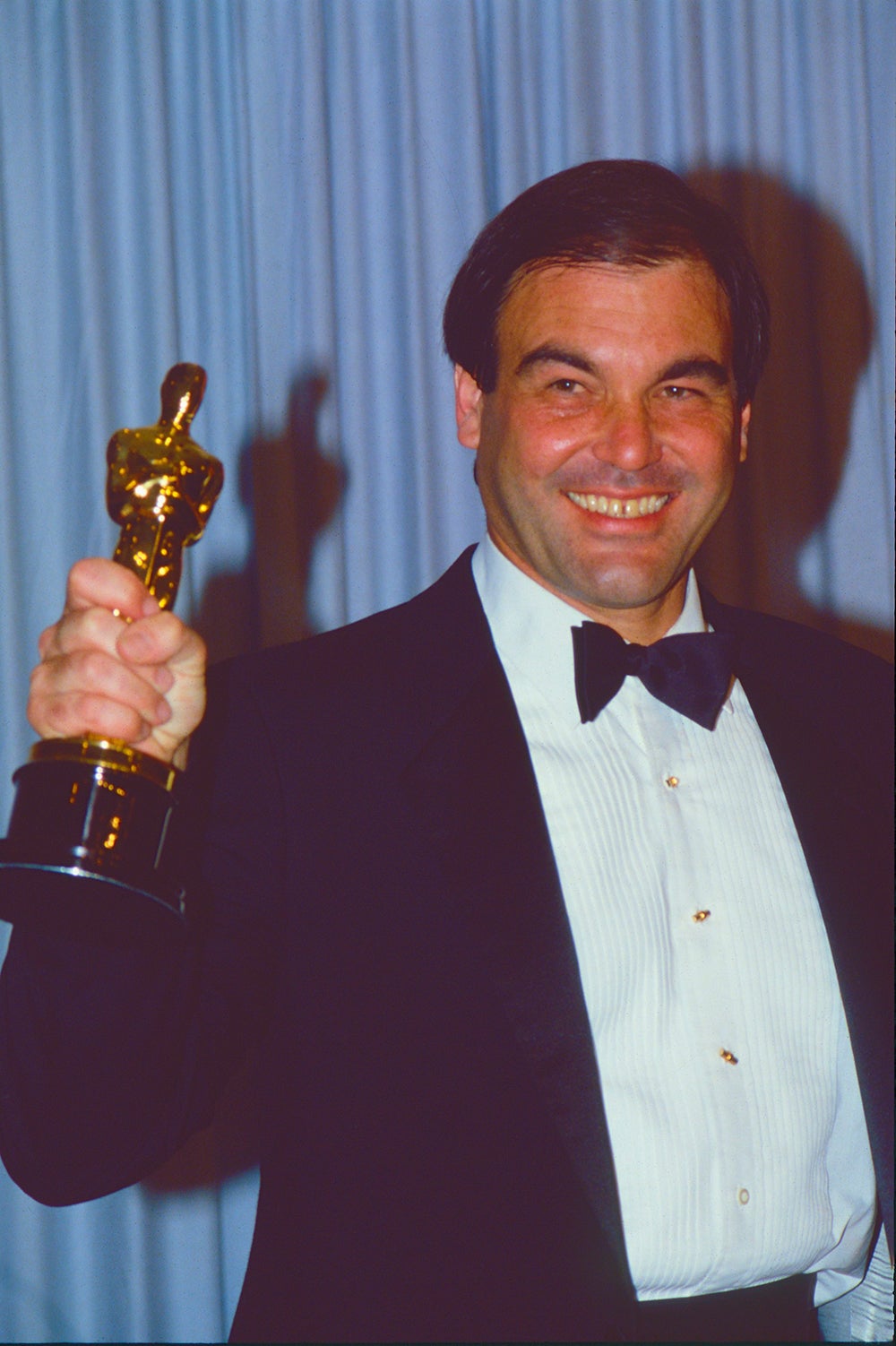 Oliver Stone with his Best Director Oscar for ‘Platoon’ in 1987